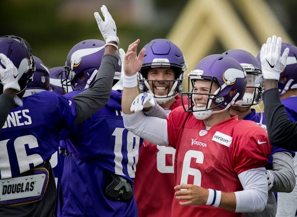 Minnesota Vikings quarterbacks and receivers enjoyed a lighthearted moment during the afternoon practice.