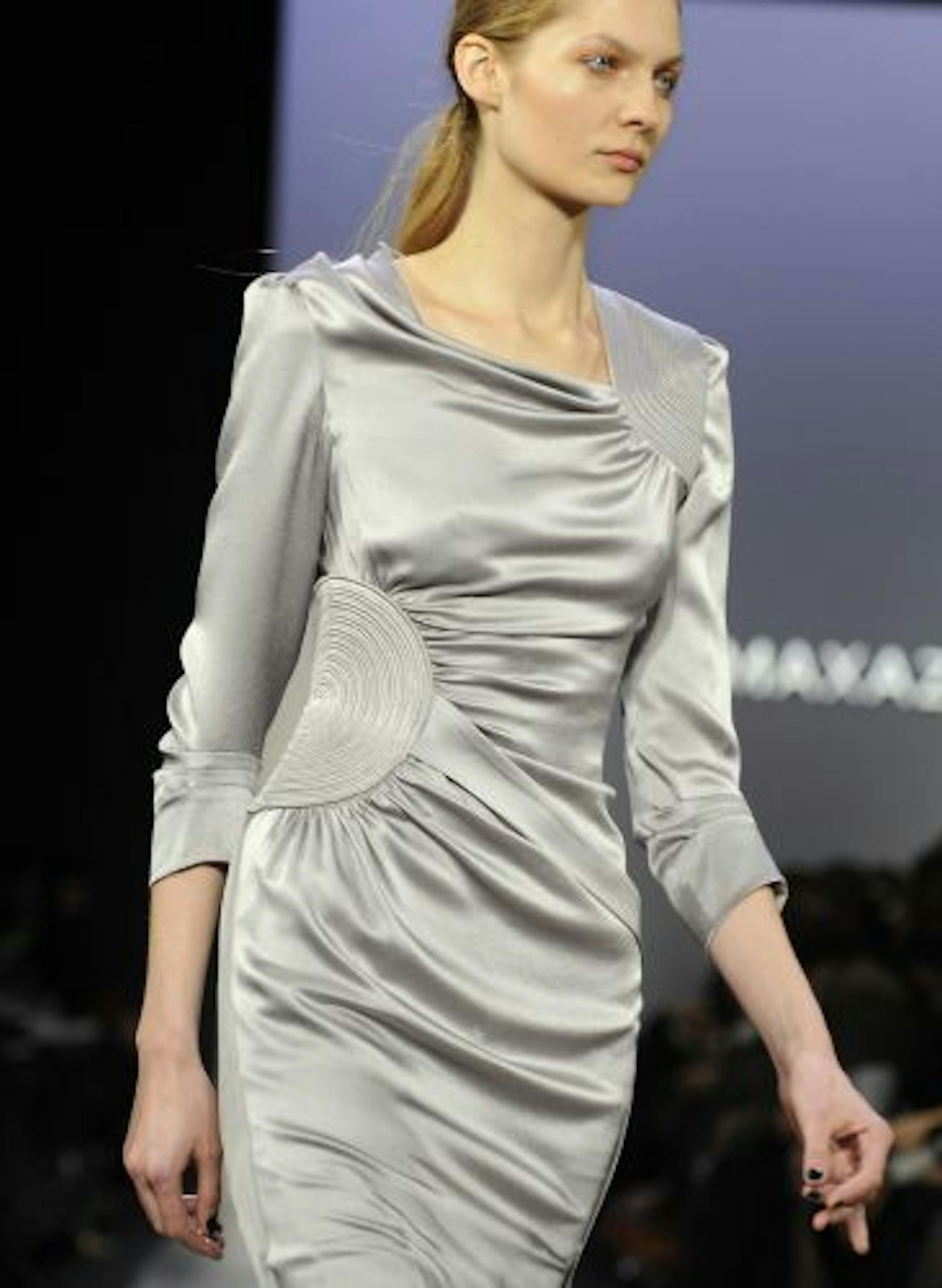 This feb. 13, 2009 file photo shows the fall 2009 collection of BCBG Max Azria is modeled during Fashion Week in Bryant Park in New York.