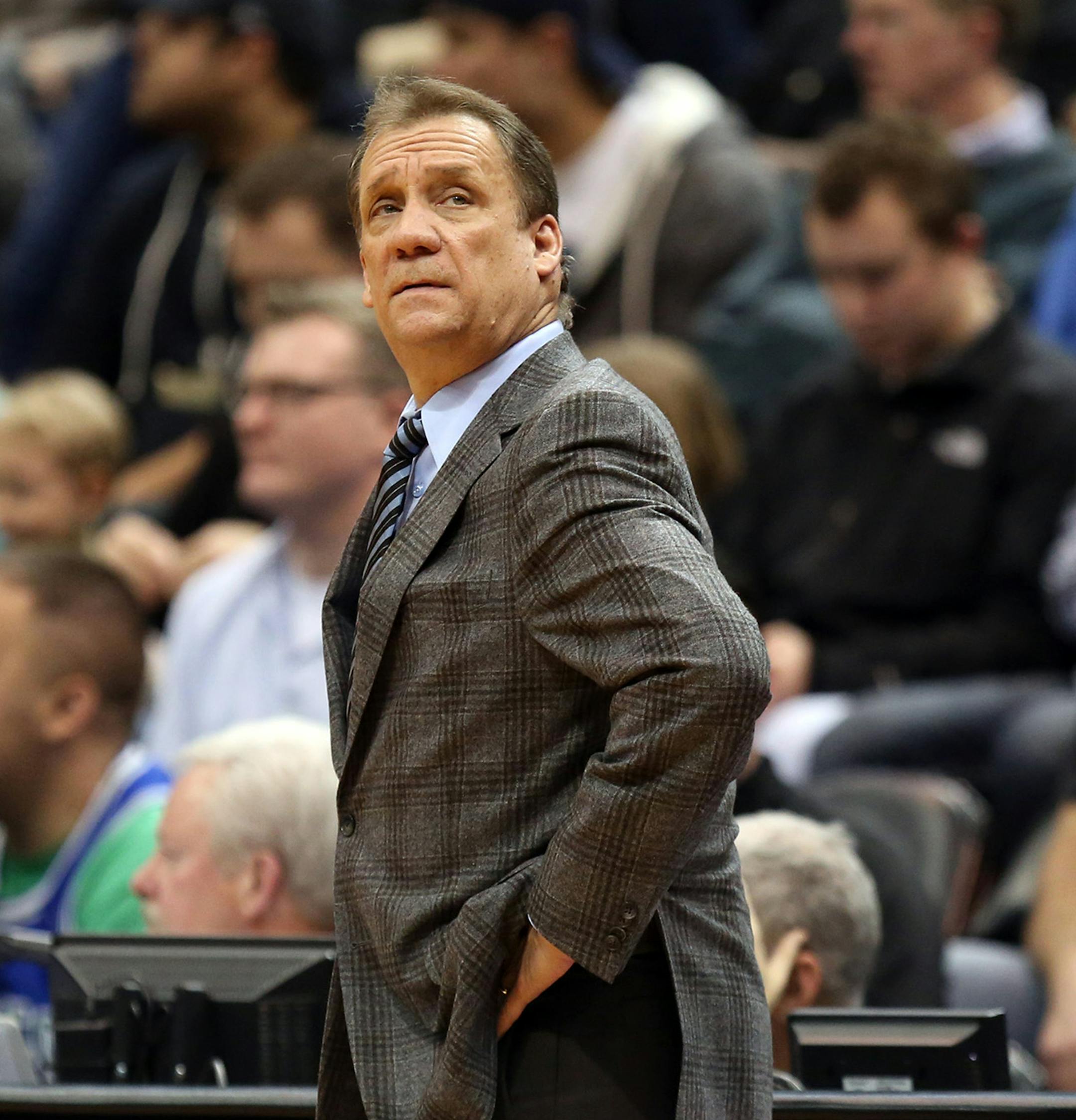 Wolves head coach Flip Saunder looked up at the clock during the first half. ] (KYNDELL HARKNESS/STAR TRIBUNE) kyndell.harkness@startribune.com Timberwolves vs San Antonio at the Target Center in Minneapolis Min., Saturday, January 10, 2014. ORG XMIT: MIN1501102035191431 ORG XMIT: MIN1510242208453837 ORG XMIT: MIN1510252159084143