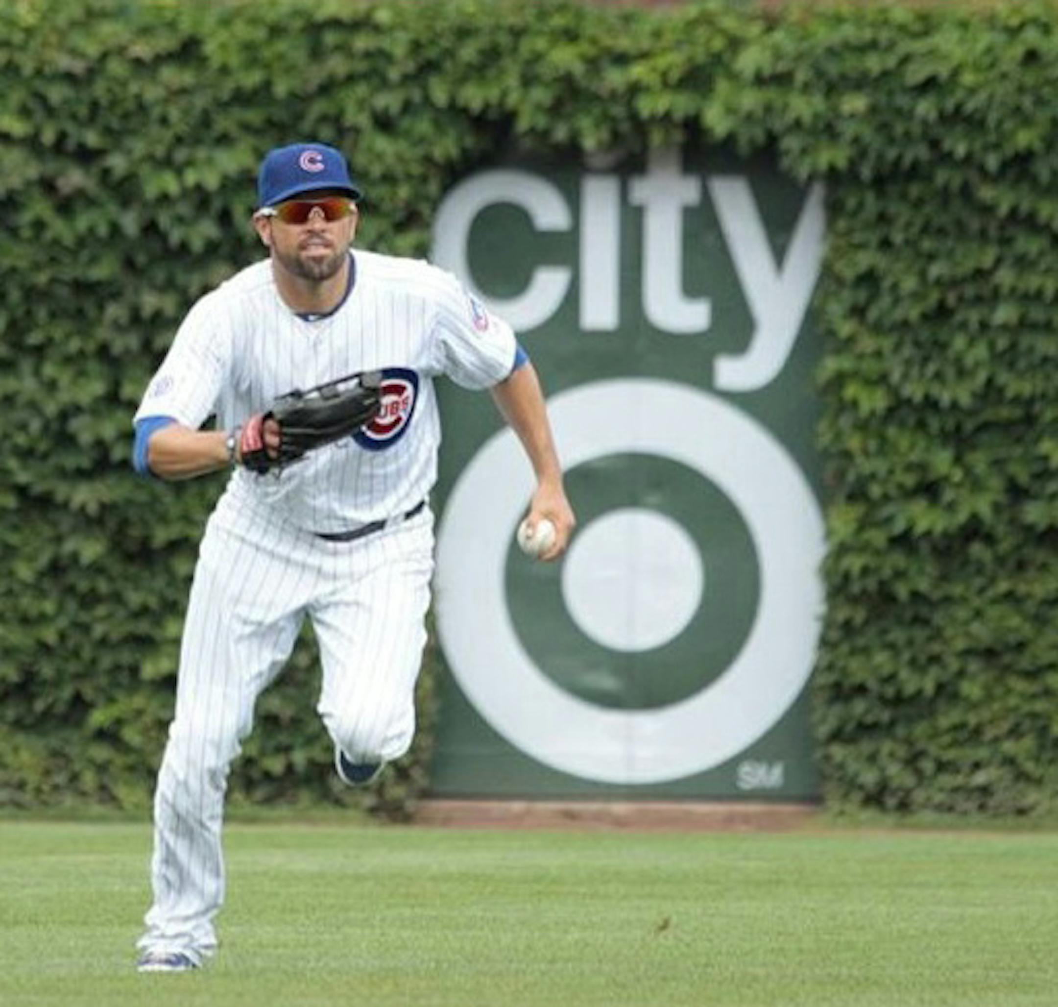 Target Corp. has placed its logo in perhaps the most valuable piece of real estate in Chicago, if not baseball: the ivy covered walls of Wrigley Field. The sponsorship deal with the Cubs is meant to plug its new CityTarget store in the city.