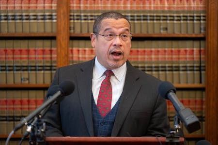 FILE-Attorney General Keith Ellison speaks during a press conference at the Attorney General’s Office inside the Minnesota State Capitol in St. Paul