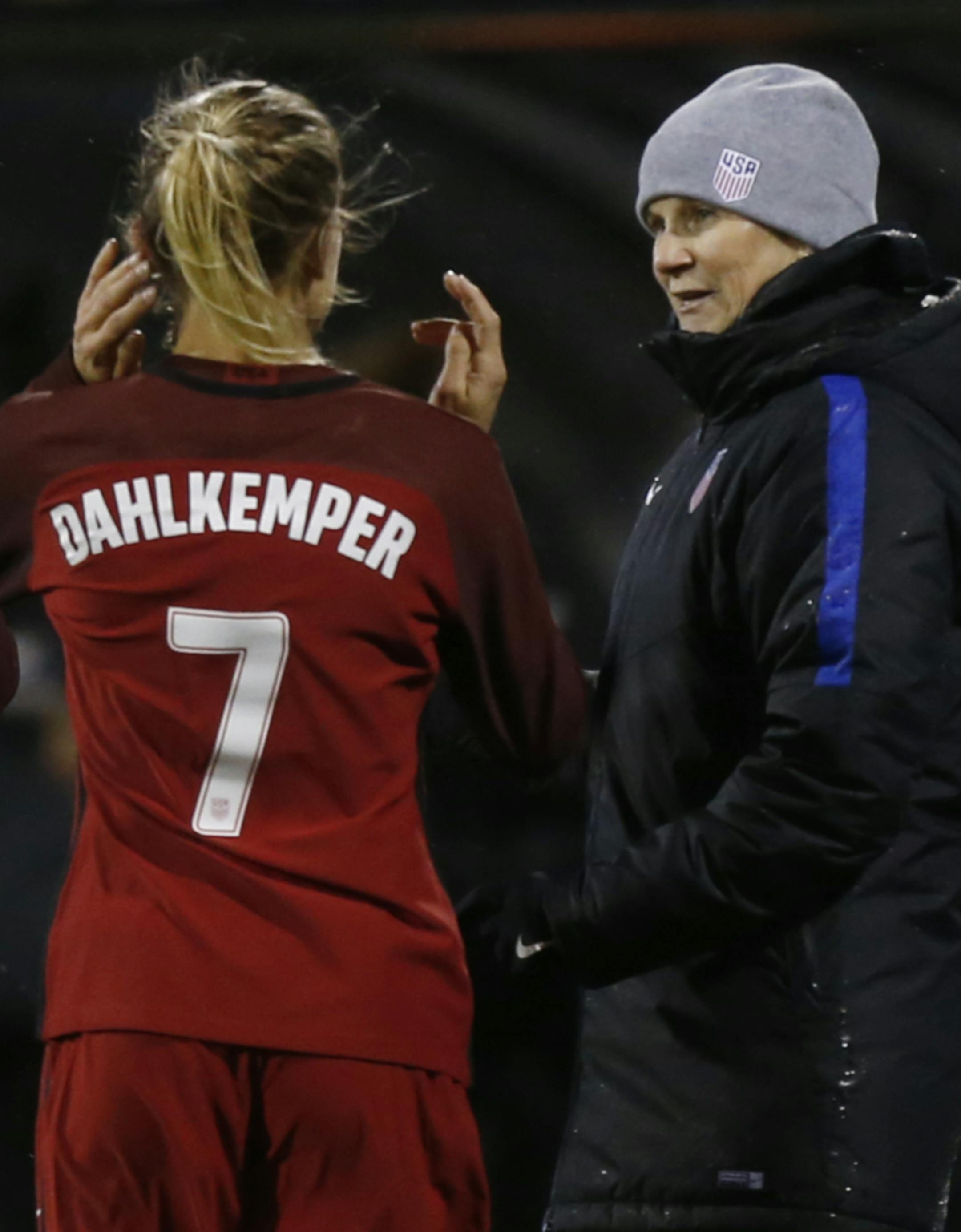 U.S. coach Jill Ellis, right, talks with Abby Dahlkemper during the first half of a SheBelieves Cup women's soccer match against Germany, Thursday, March 1, 2018, in Columbus, Ohio. The United States won 1-0. (AP Photo/Jay LaPrete)