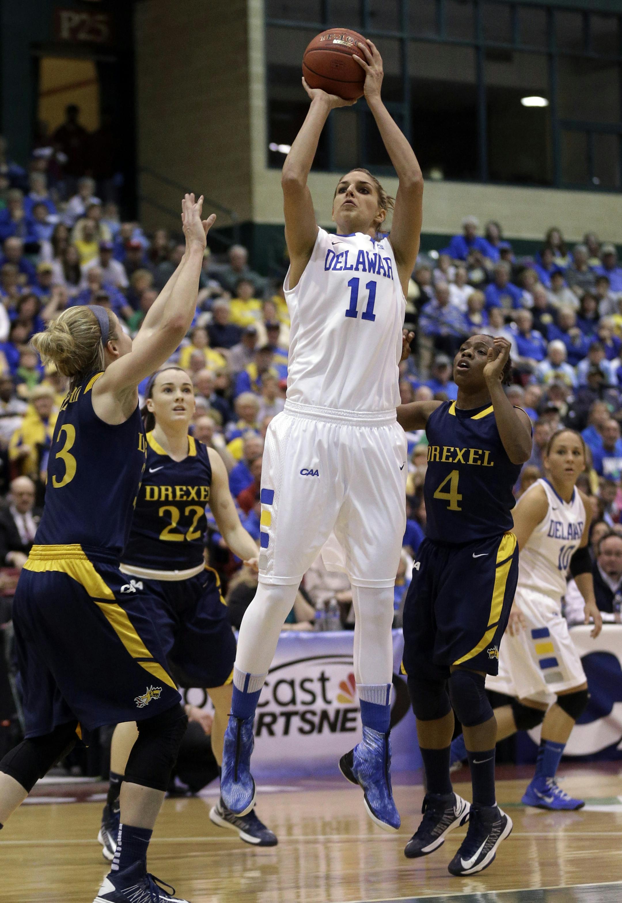 Delaware forward Elena Delle Donne (11) shoots over Drexel guards, from left, Fiona Flanagan, Meghan Creighton and Renee Johnson-Allen during the first half of an NCAA college basketball game in the championship of the Colonial Athletic Association conference tournament in Upper Marlboro, Md., Sunday, March 17, 2013. (AP Photo/Patrick Semansky) ORG XMIT: MIN2013032118211919