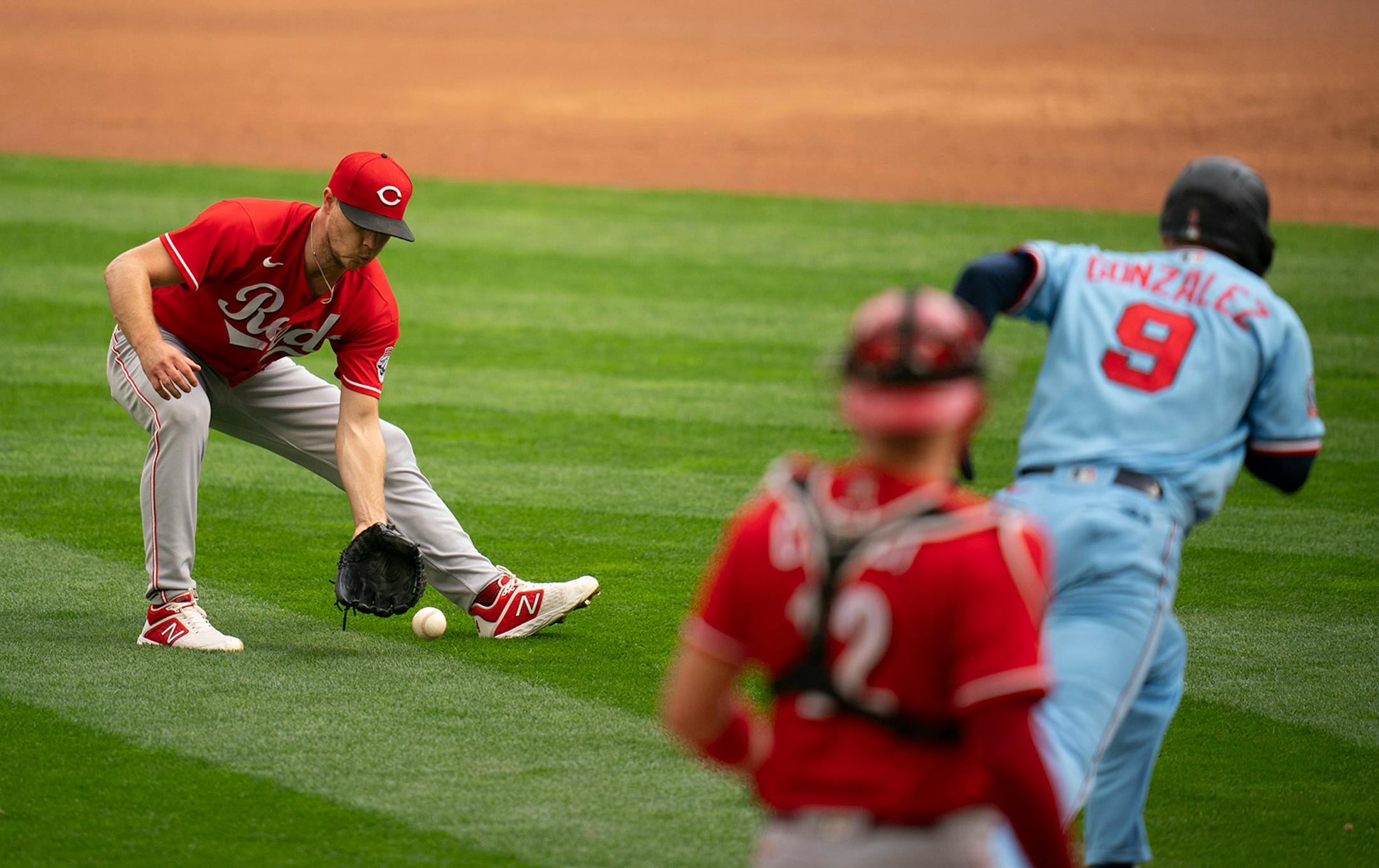 Cincinnati Reds starting pitcher Sonny Gray (54) fielded a third inning grounder by Minnesota Twins third baseman Marwin Gonzalez (9).