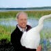 Carrol Henderson, who will retire soon from the DNR, was responsible for the largest release ever of trumpeter swans to the wild during his tenure as 