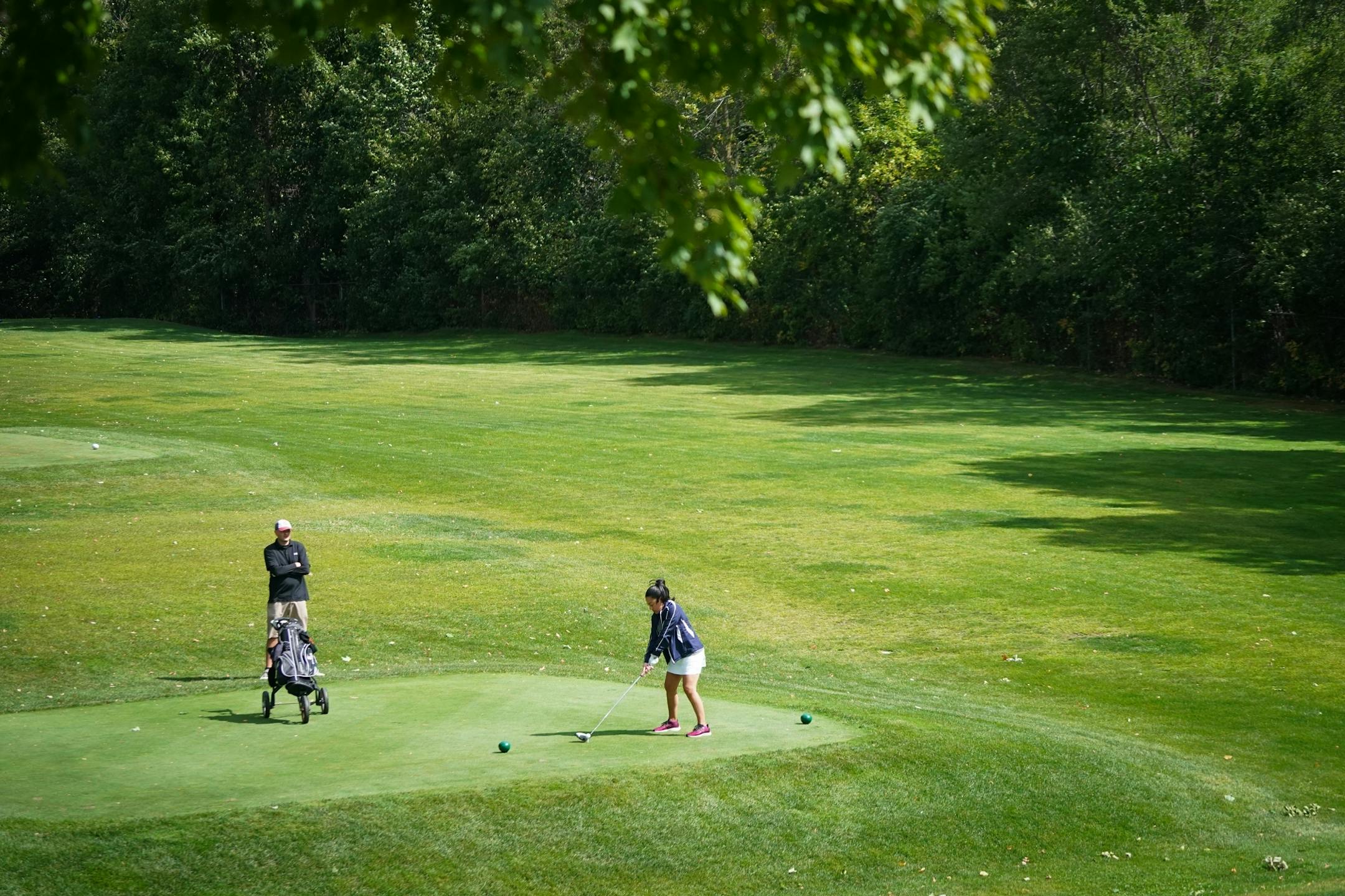 After playing golf for two months, Claudia Murvartian from St. Paul is hooked. She and her boyfriend Charles Mann started the COVID-19 shutdown by walking ten miles a day. When that became boring, she said, she decided to go to the driving range and hit some balls with Mann.