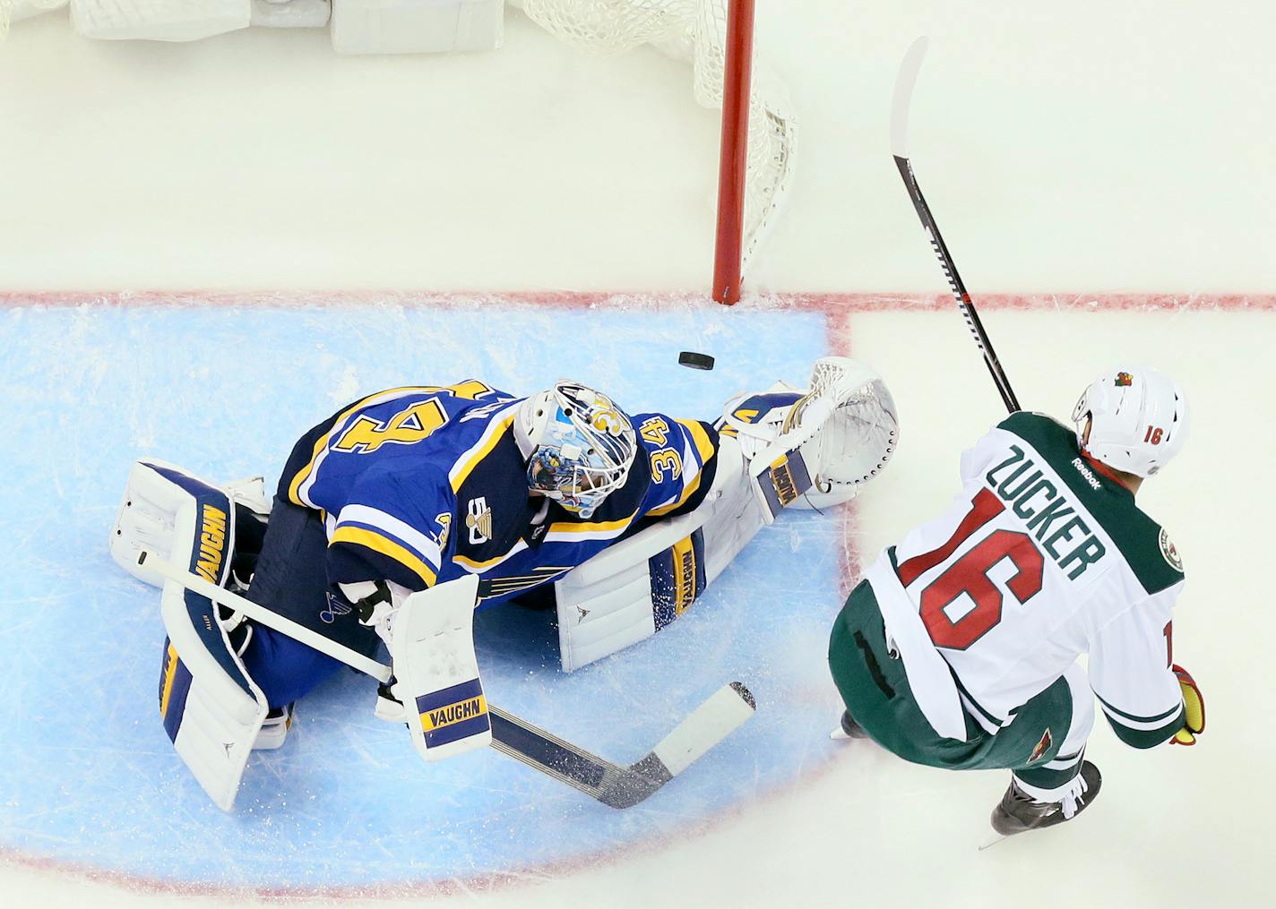 St. Louis Blues goaltender Jake Allen, left, stops a breakaway shot by the Minnesota Wild's Jason Zucker in the first period on Thursday, Oct. 13, 2016, at the Scottrade Center in St. Louis. The Blues won, 3-2. (Chris Lee/St. Louis Post-Dispatch/TNS)