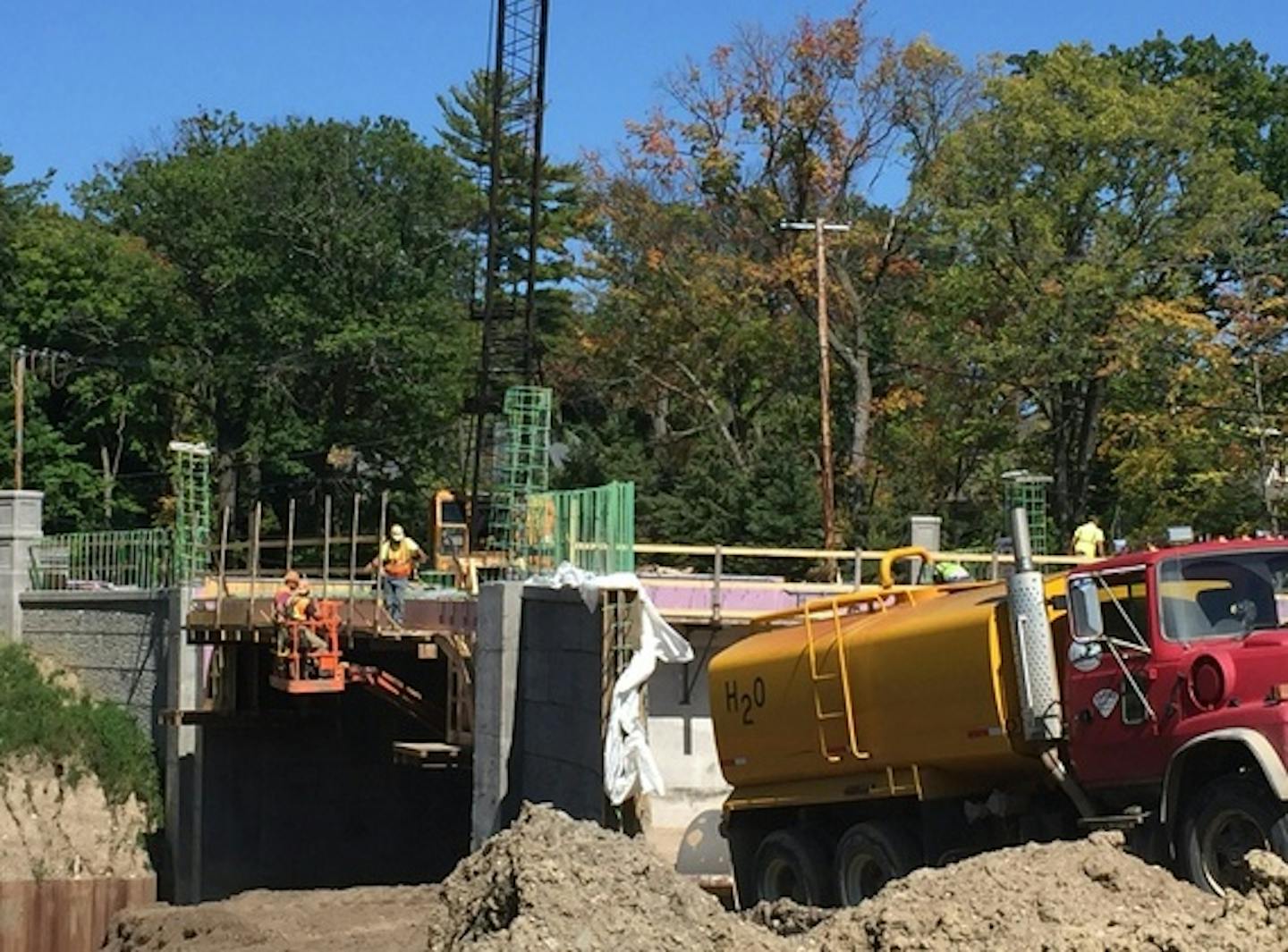 Crews work on building a new bridge over BNSF railroad tracks along Bushaway Road, which is part of County Road 101. It's slated to reopen Nov. 1, 2016. Photo courtesy of Hennepin County.