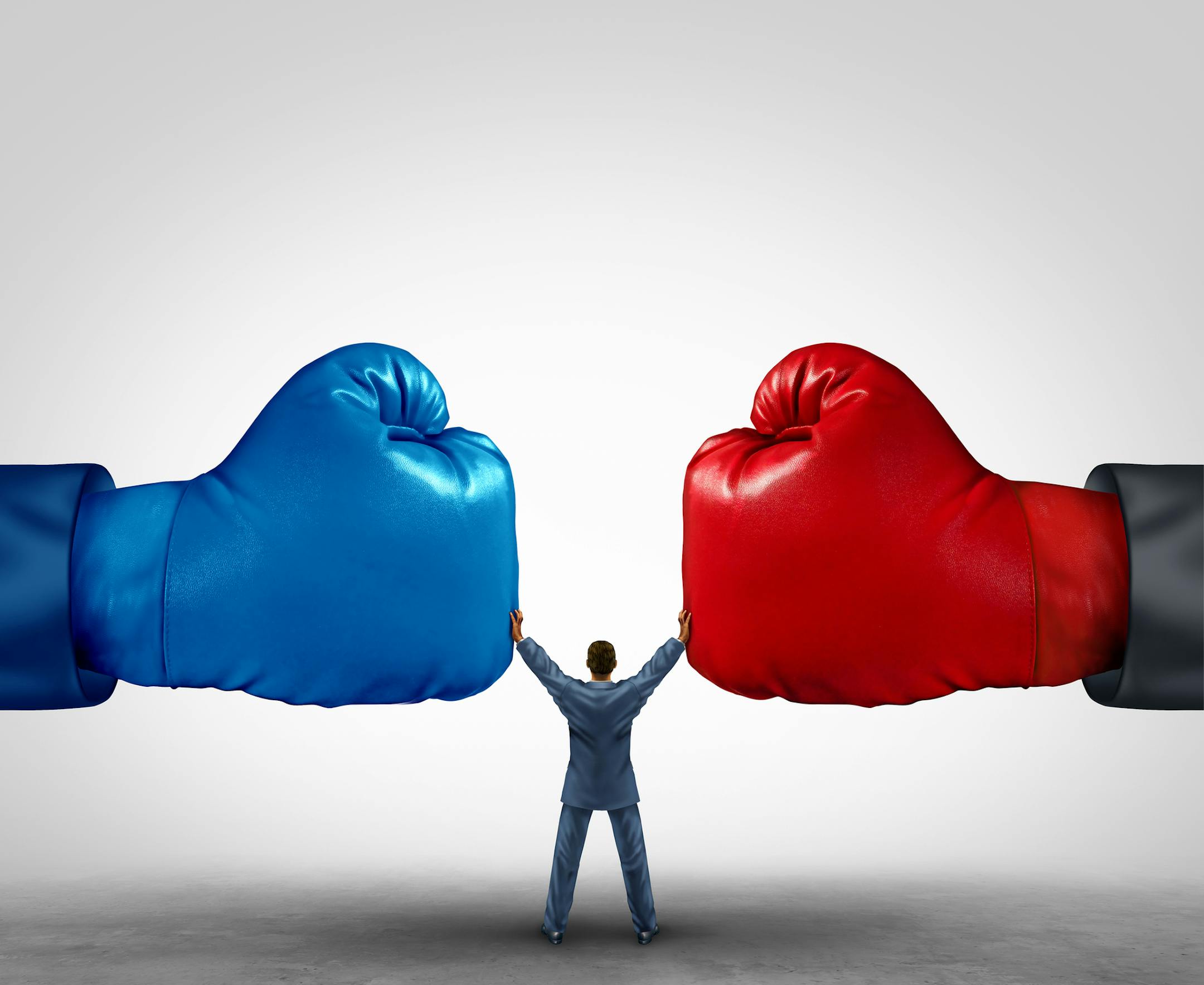 Mediate and legal mediation business concept as a businessman or person separating two boxing glove opposing competitors as an arbitration success symbol for finding common interests to lawfully solve a conflict.