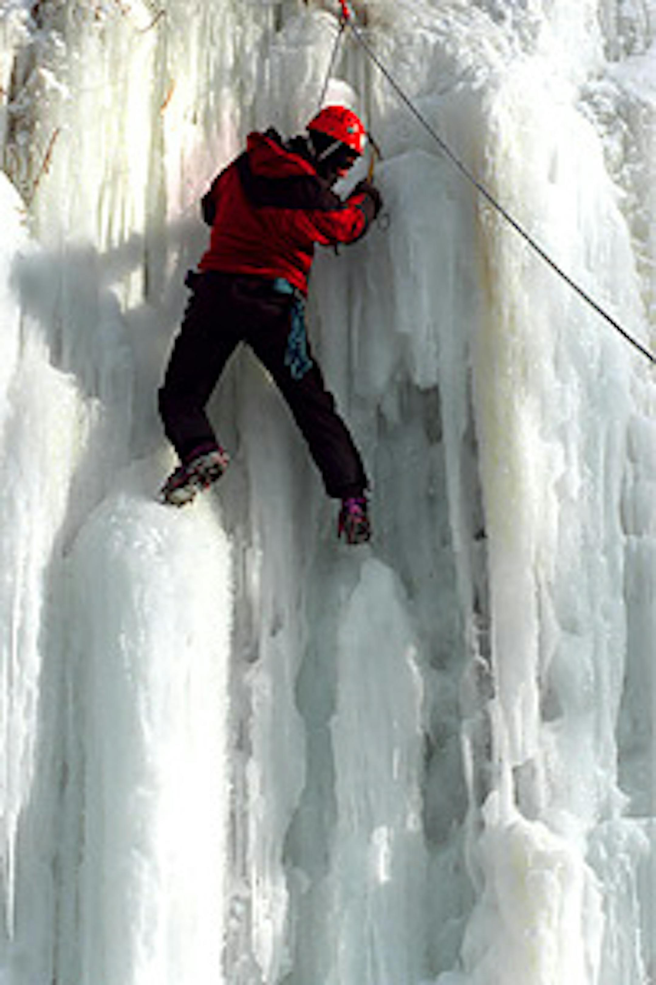 Bill Swanson of St. Paul climbed a wall of ice at Harriet Island.