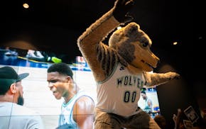 Even Crunch gets down at Tom's Watch Bar. He was there when the Timberwolves won Game 7 last season against the Denver Nuggets.