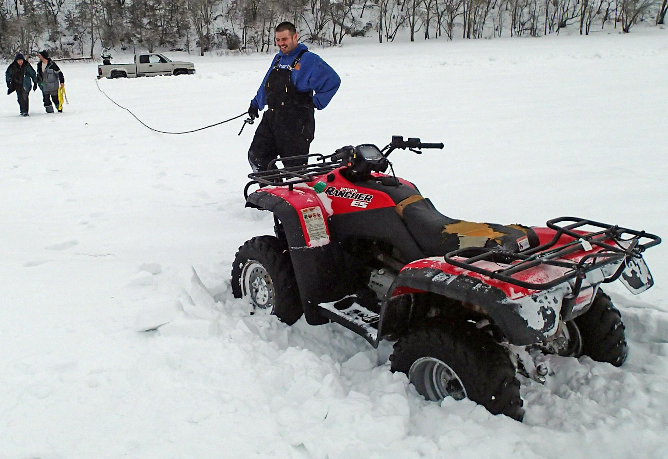 Anderson became stuck on the river in his four-wheeler and welcomed help from anglers.