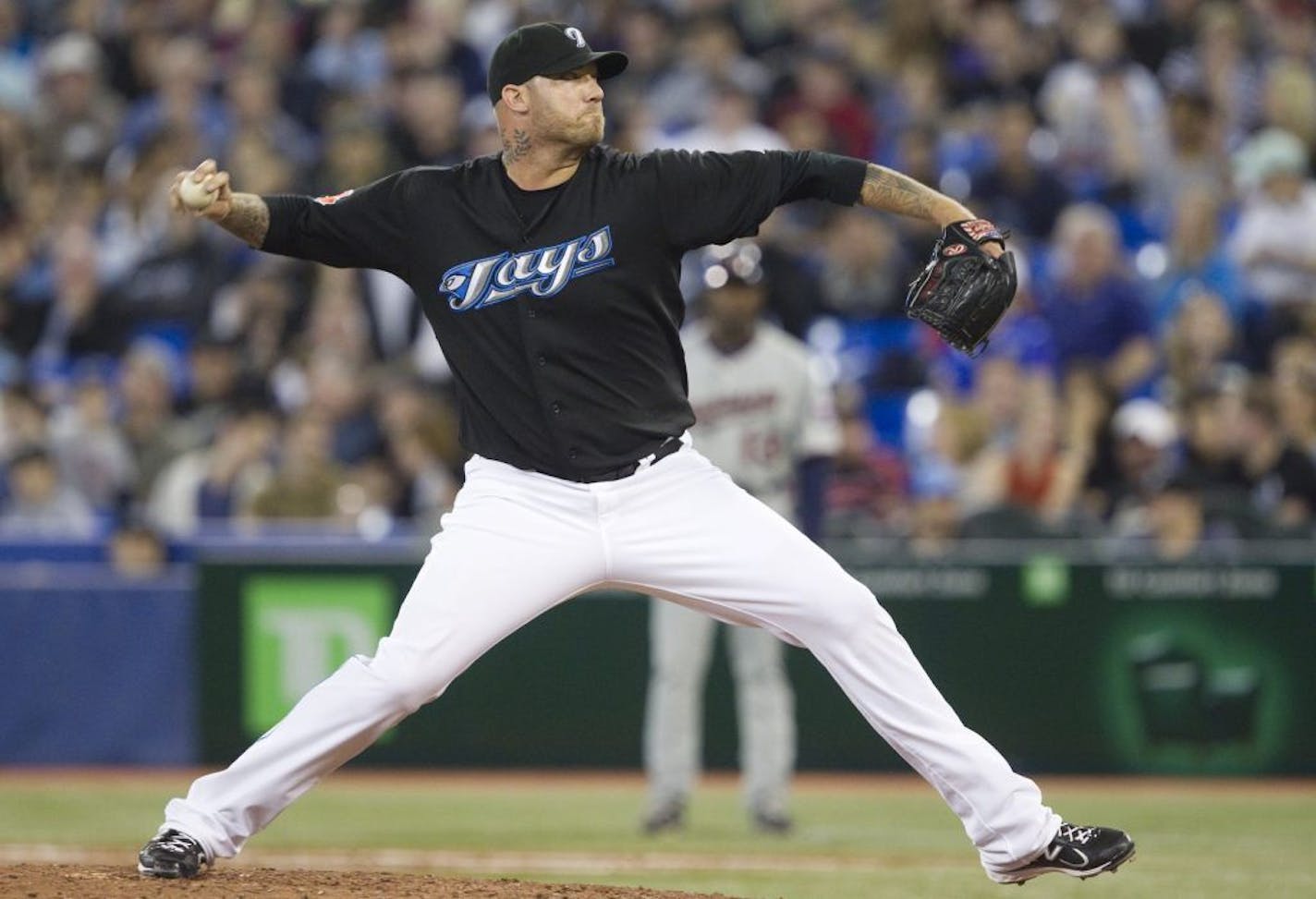 Toronto Blue Jays relief pitcher Jon Rauch works against the Minnesota Twins during ninth-inning MLB baseball game action in Toronto, Sunday, April 3, 2011. The Twins defeated the Blue Jays 4-3.