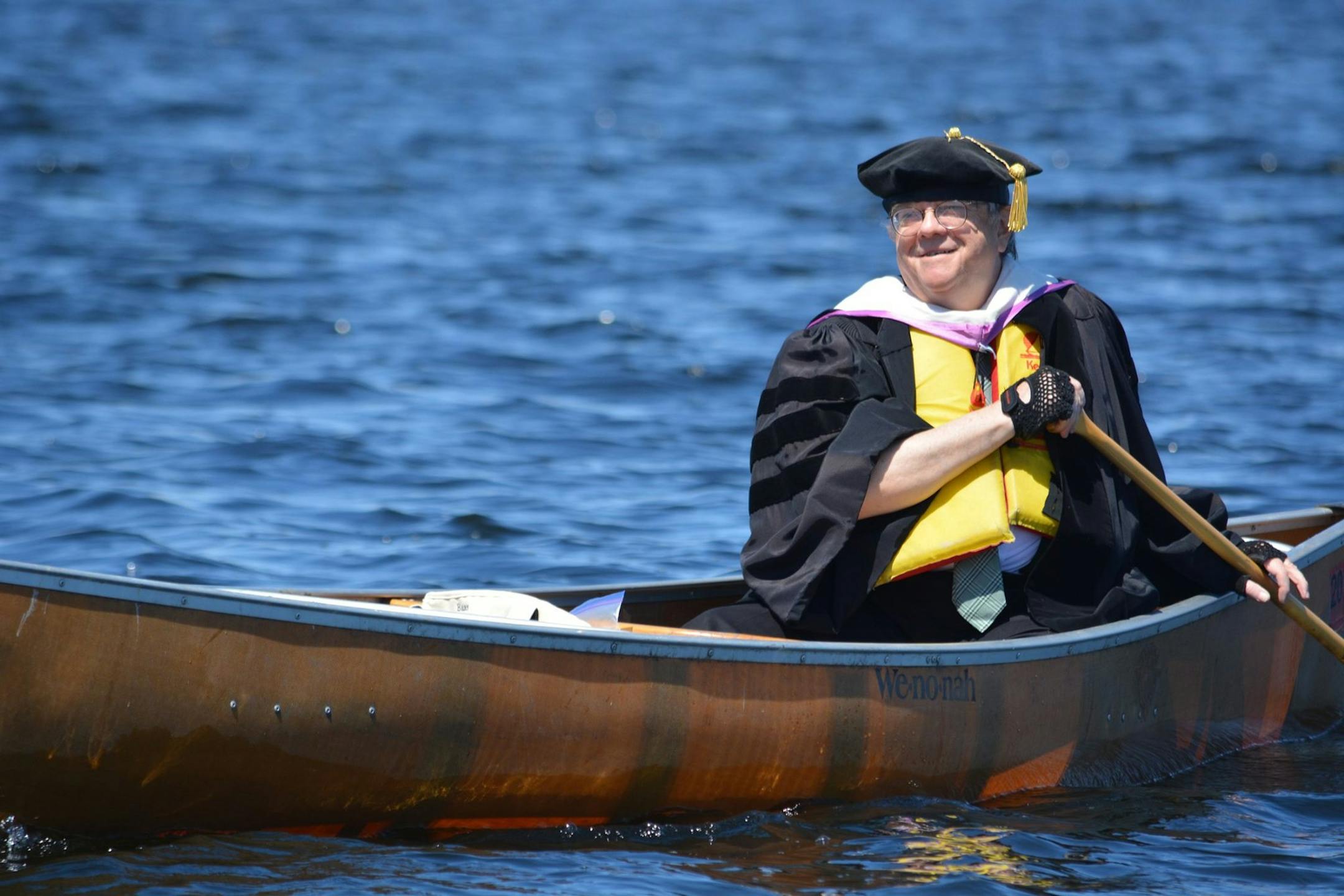 Bemidji State University Facebook page: Professor Brian Donovan paddled to Friday's commencement ceremony. ORG XMIT: h-AQO6-jZdA3MwoH9bno