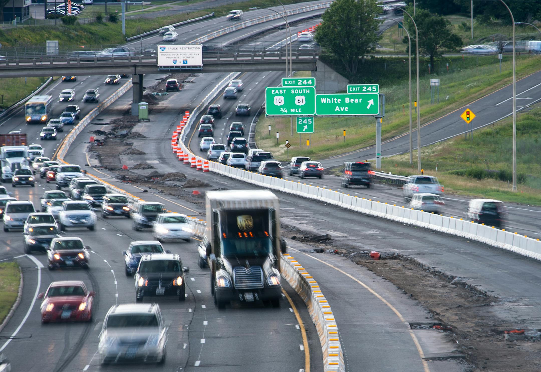 Motorists travelled the I-94 freeway between St. Paul and Maplewood past visible scarring left behind by ongoing construction. ] (AARON LAVINSKY/STAR TRIBUNE) aaron.lavinsky@startribune.com Thousands of folks will be hitting the road this weekend for the 4th of July holiday. Even though most construction projects will be idle, the traffic work zones will still be there, which means there will be lots of continued lane closures and traffic diversions. We photograph various construction zones whic