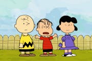 FILE - In this image released by Warner Bros. Entertainment, Linus, center, is shown with Charlie Brown and Lucy during a new animated webisode series