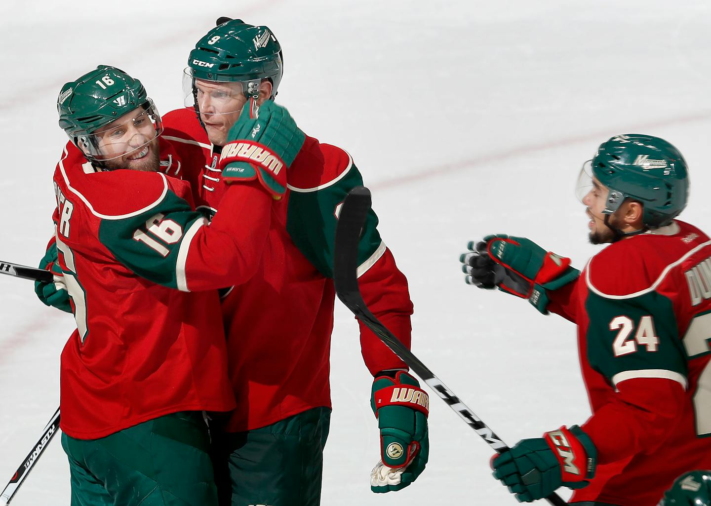 Jason Zucker (16) and Mikko Koivu (9) celebrated a Wild goal by Koivu in the second period. ] CARLOS GONZALEZ cgonzalez@startribune.com - November 23, 2016, St. Paul, MN, Xcel Energy Center, NHL, Minnesota Wild vs. Winnipeg Jets