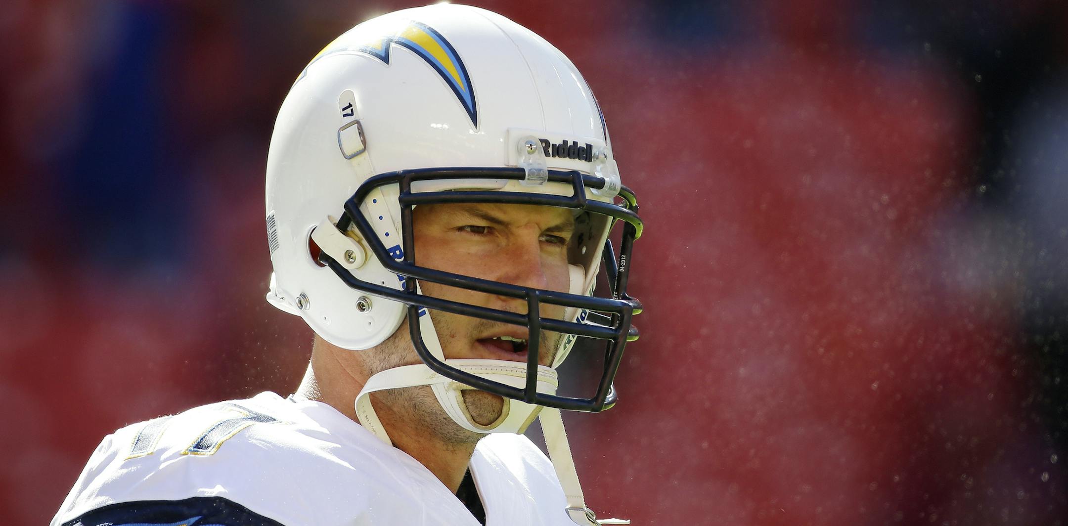 San Diego Chargers quarterback Philip Rivers looks around the field before a NFL football game against the Washington Redskins in Landover, Md., Sunday, Nov. 3, 2013. (AP Photo/Alex Brandon)