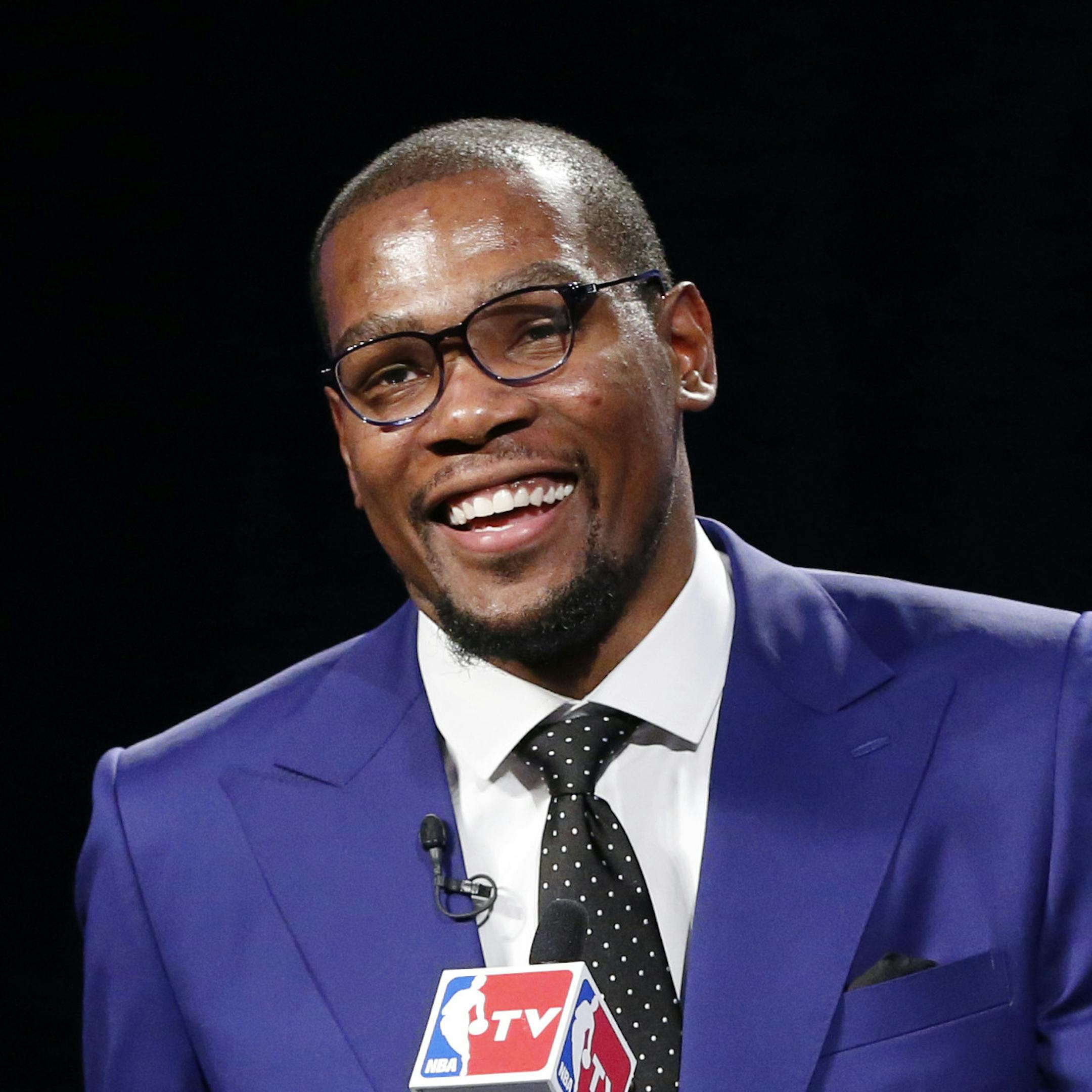 Oklahoma City Thunder's Kevin Durant speaks at the news conference announcing that that Durant is the winner of the 2013-14 Kia NBA Basketball Most Value Player Award in Oklahoma City, Tuesday, May 6, 2014. (AP Photo/Sue Ogrocki)