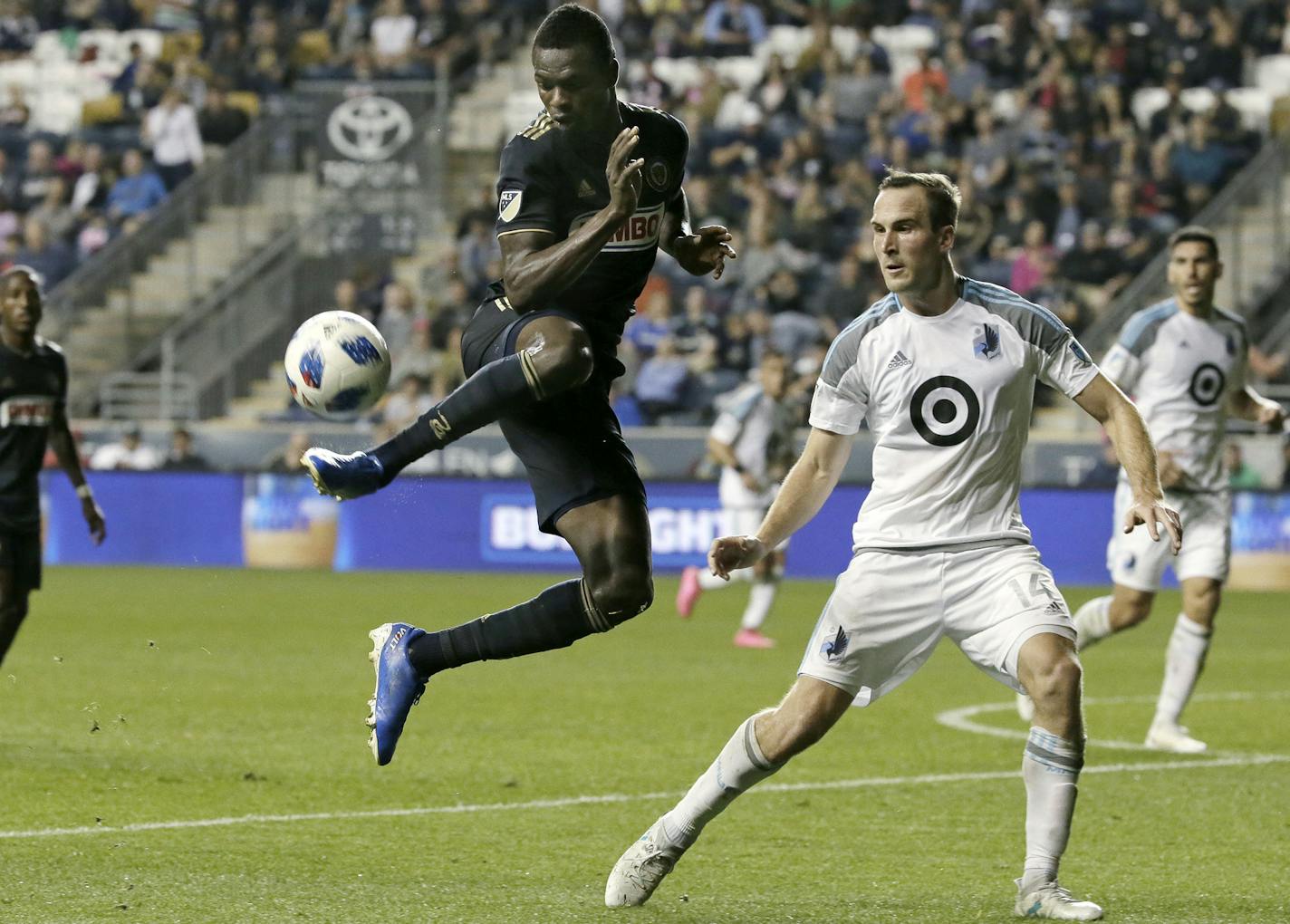 Union&#xed;s # 19 Cory Burke controls the ball as United&#xed;s Brent Kallman covers in the 2nd half of the Minnesota United at Philadelphia Union MLS match at Talen Energy Stadium in Chester, Pa. on October 6, 2018. MANDATORY CREDIT: ELIZABETH ROBERTSON / Staff Photographer