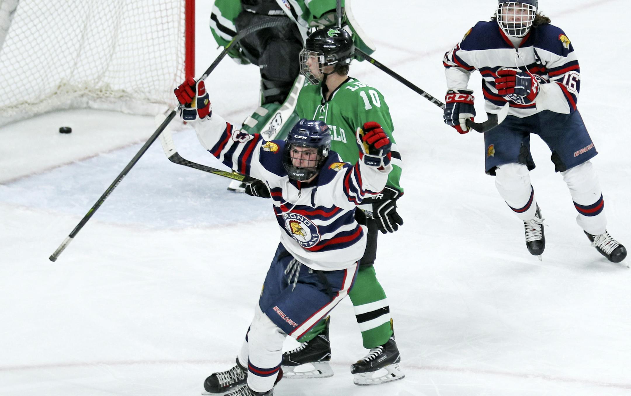 Oronoís Thomas Walker celebrates Lucas Jorgensonís goal on LDCís Darby Halonen in the 2nd period. ] Class 1A boys' hockey quarterfinals
Litchfield Dassel Cokato -vs- Orono
BRIAN PETERSON ï brian.peterson@startribune.com
St. Paul, MN 03/07/18