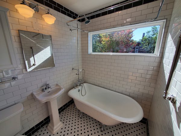 'Half 1950s, half 1970s' bathroom in Uptown home gets timeless makeover