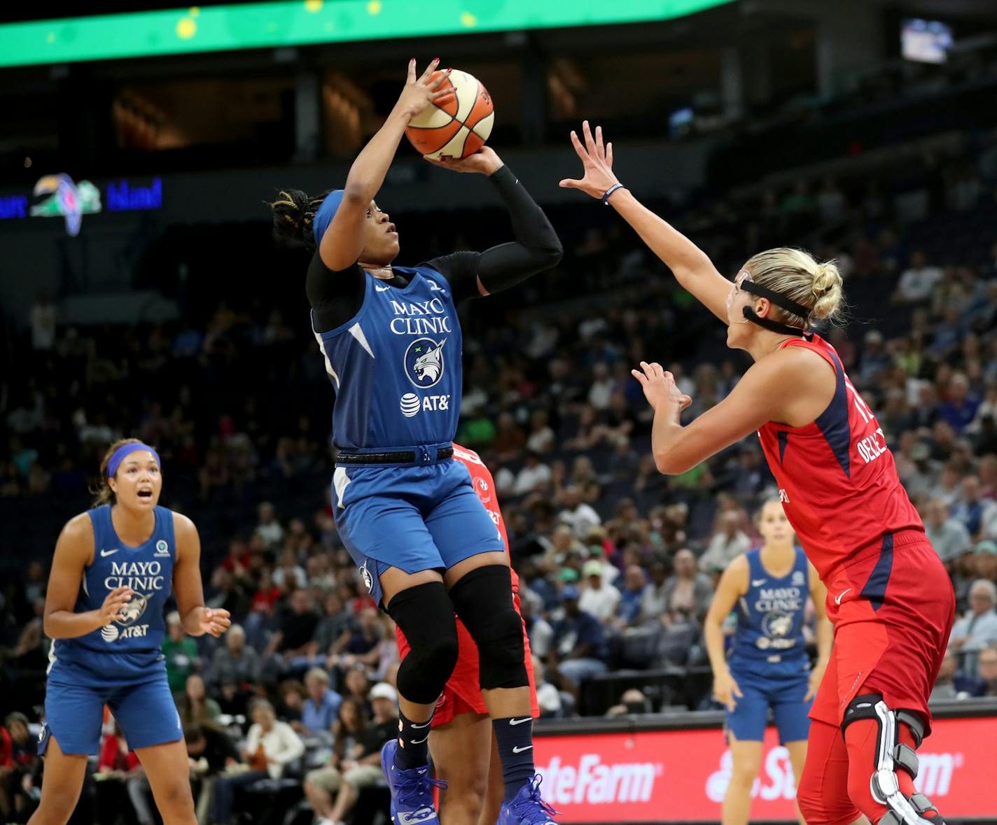 The Minnesota Lynx's Odyssey Sims (1) shoots over the Washington Mystics' Elena Delle Donne (11) during the first half of the Lynx game Friday, Aug. 16, 2019, at the Target Center in Minneapolis, MN.] DAVID JOLES &#x2022; david.joles@startribune.com Washington at Lynx