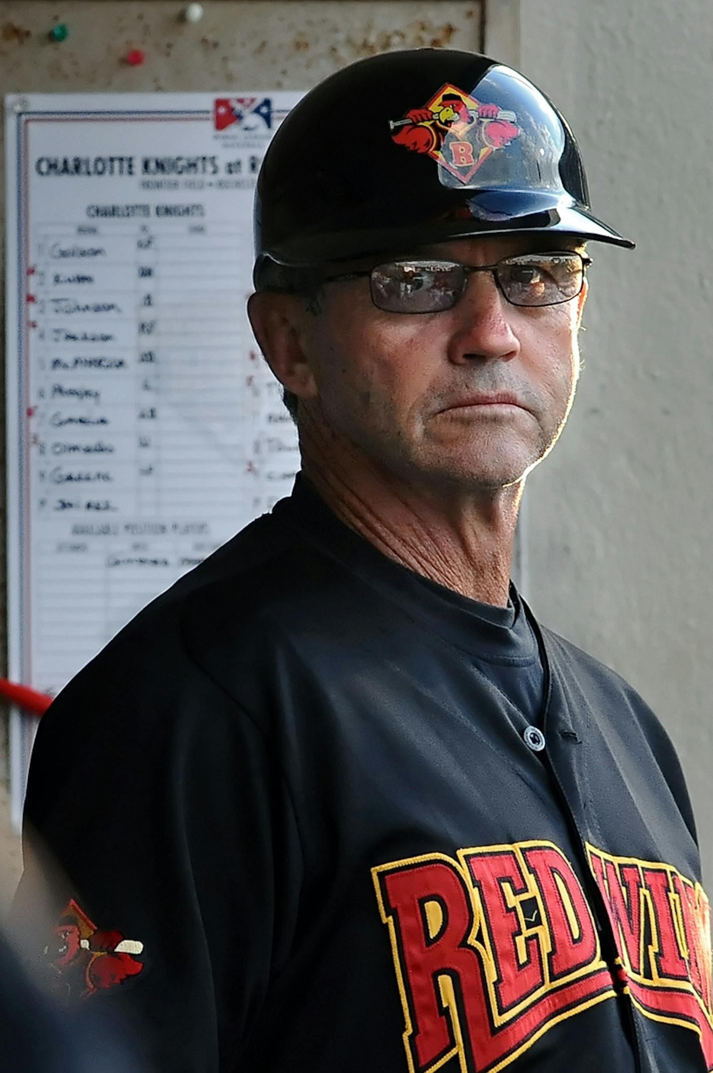 Rochester Red Wings' manager Gene Glynn watches from the dugout during game against the Charlotte Knights at Frontier Field on Monday, June 25, 2012. ORG XMIT: MIN2013122723022063 ORG XMIT: MIN1408152150336624