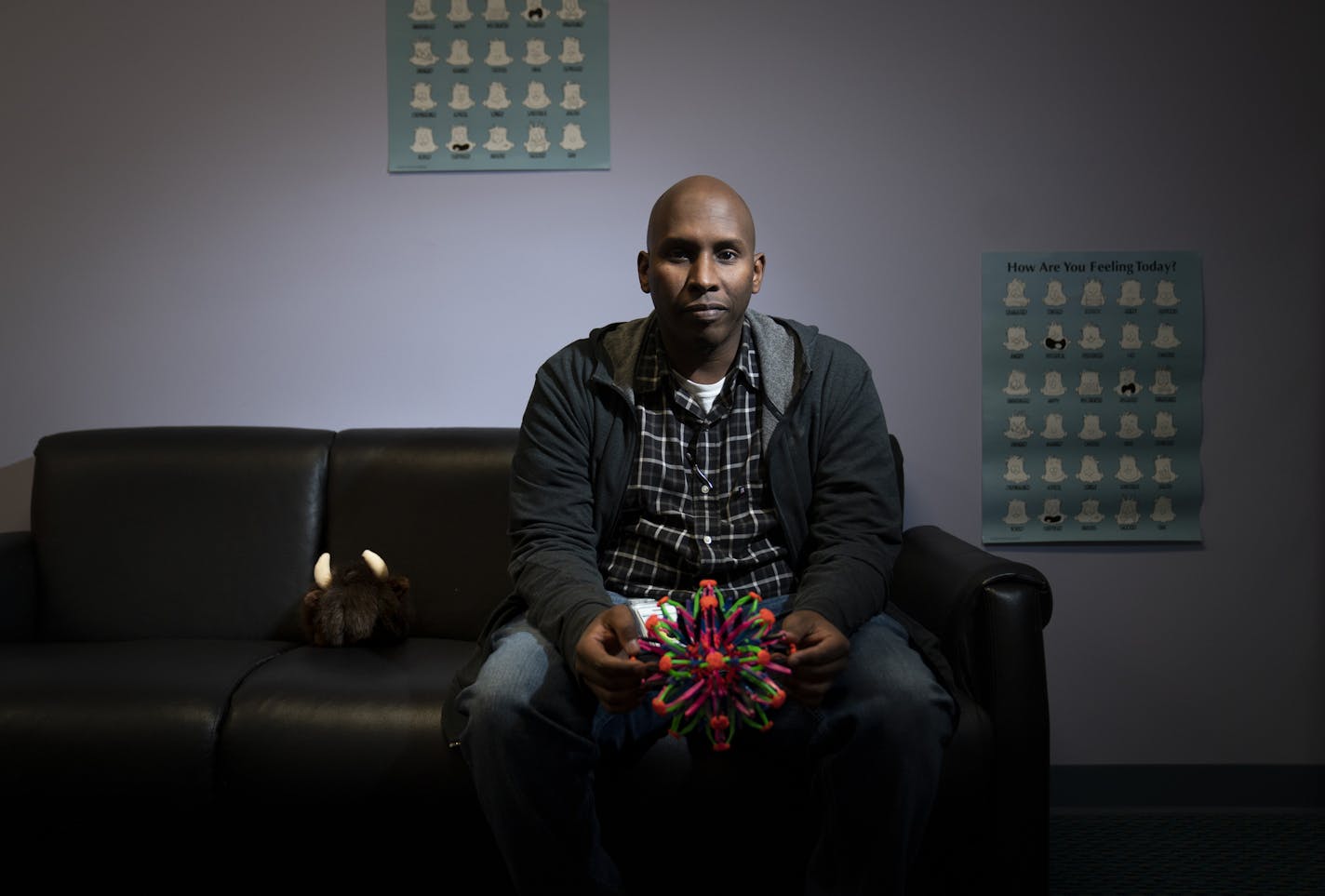 Yonis Gabow posed for a picture in his counseling room at Minnesota Math and Science Academy -- a St. Paul charter school with about 500 K-12 students, 90% of whom are of Somali descent, in St. Paul.