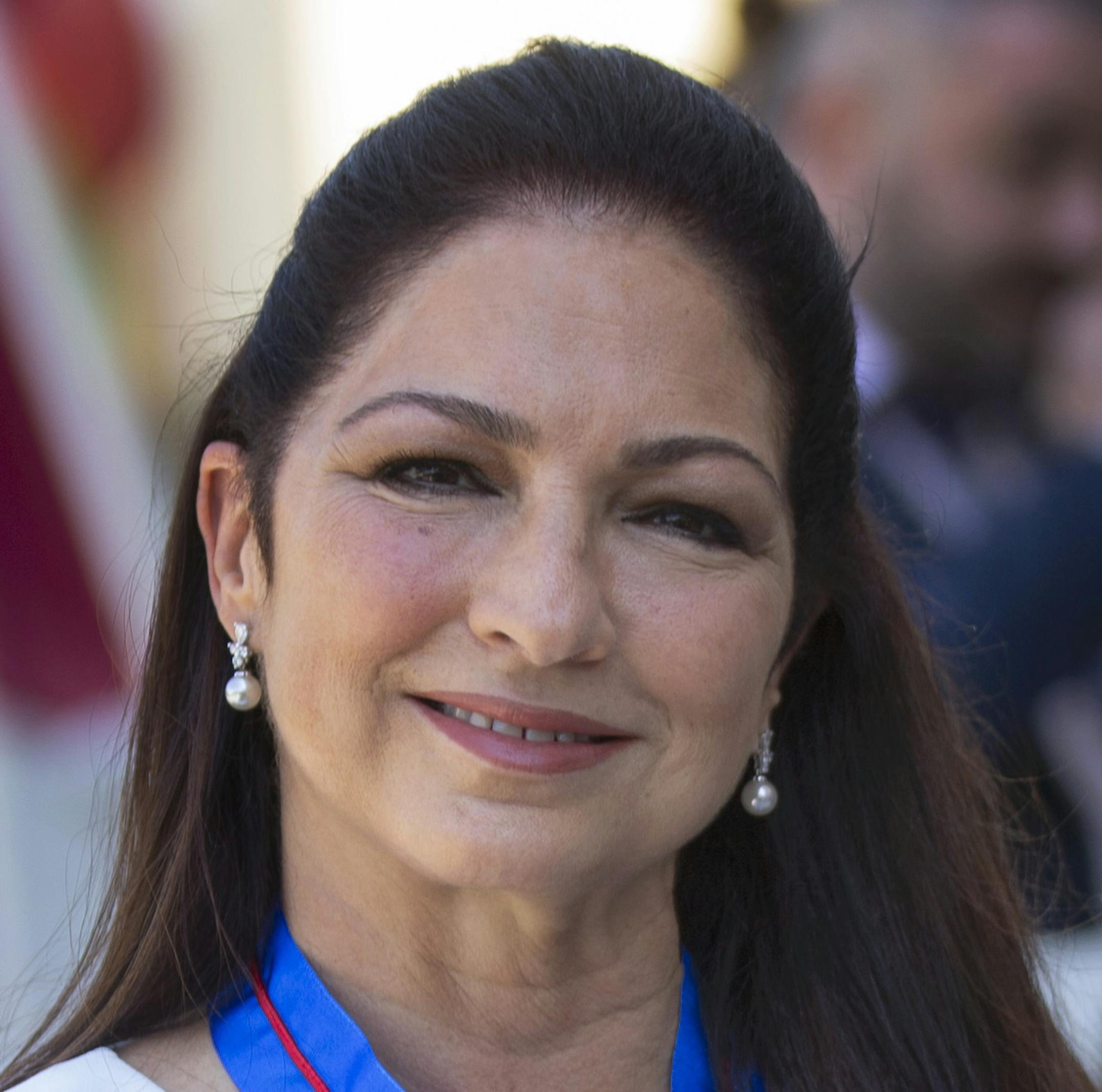 Grammy award-winner singer and composer Gloria Estefan poses for the media after being awarded with the Gold Medal of the fine arts at the Royal Theatre in Madrid, Monday, July 23, 2018. The prize is given annually by the Spanish government to reward excellency in arts, theatre and music. (AP Photo/Francisco Seco)