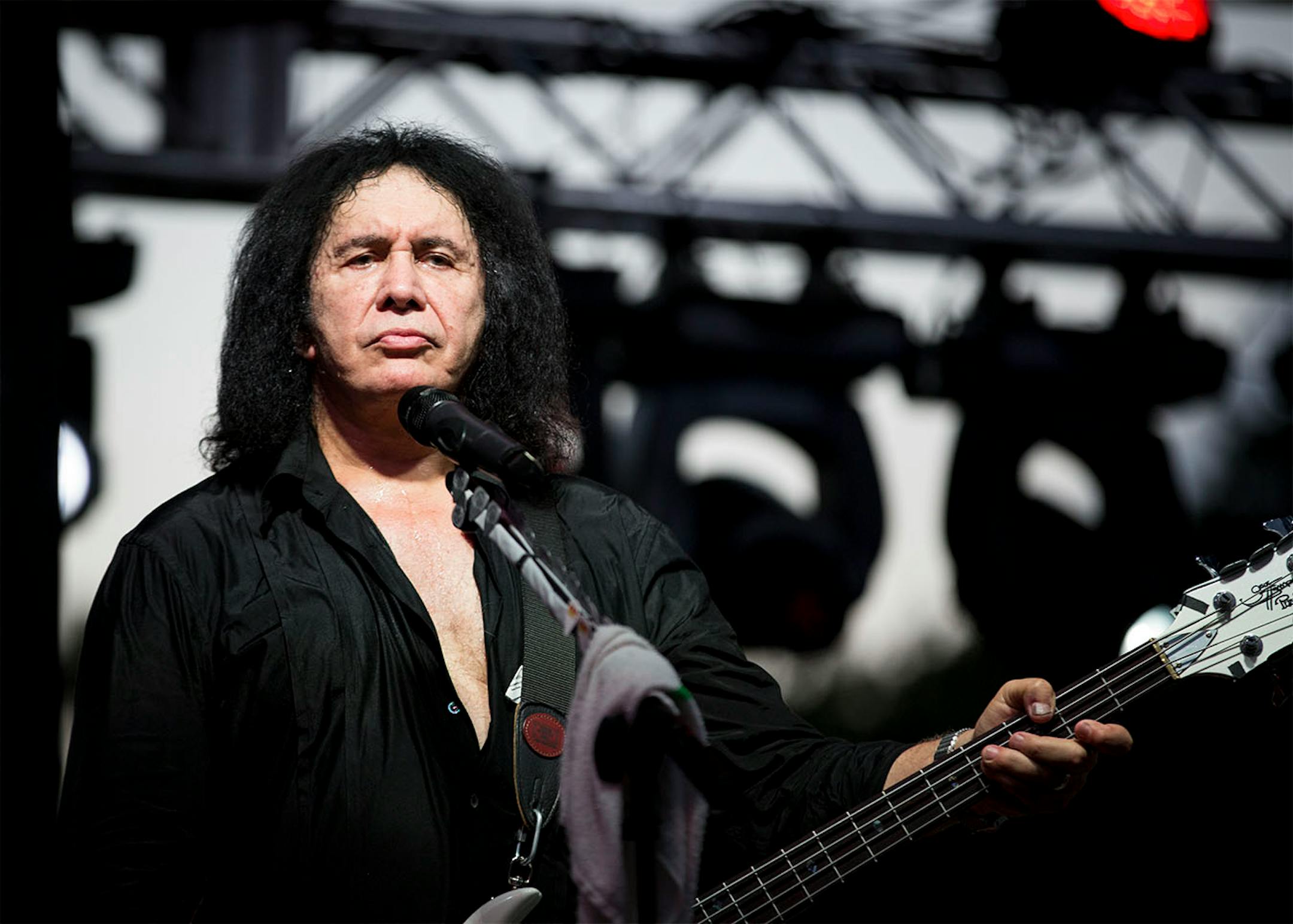 Gene Simmons of Kiss performed with the band on stage during a charity concert at philanthropist Martha "Muffy" MacMillan's home on Tuesday, August 2, 2016, in Long Lake, Minn.