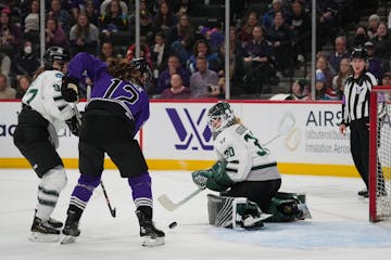 Minnesota forward Kelly Pannek (12) scores against Boston goaltender Emma Söderberg in last Saturday's game at Xcel Energy Center. 



Minnesota host