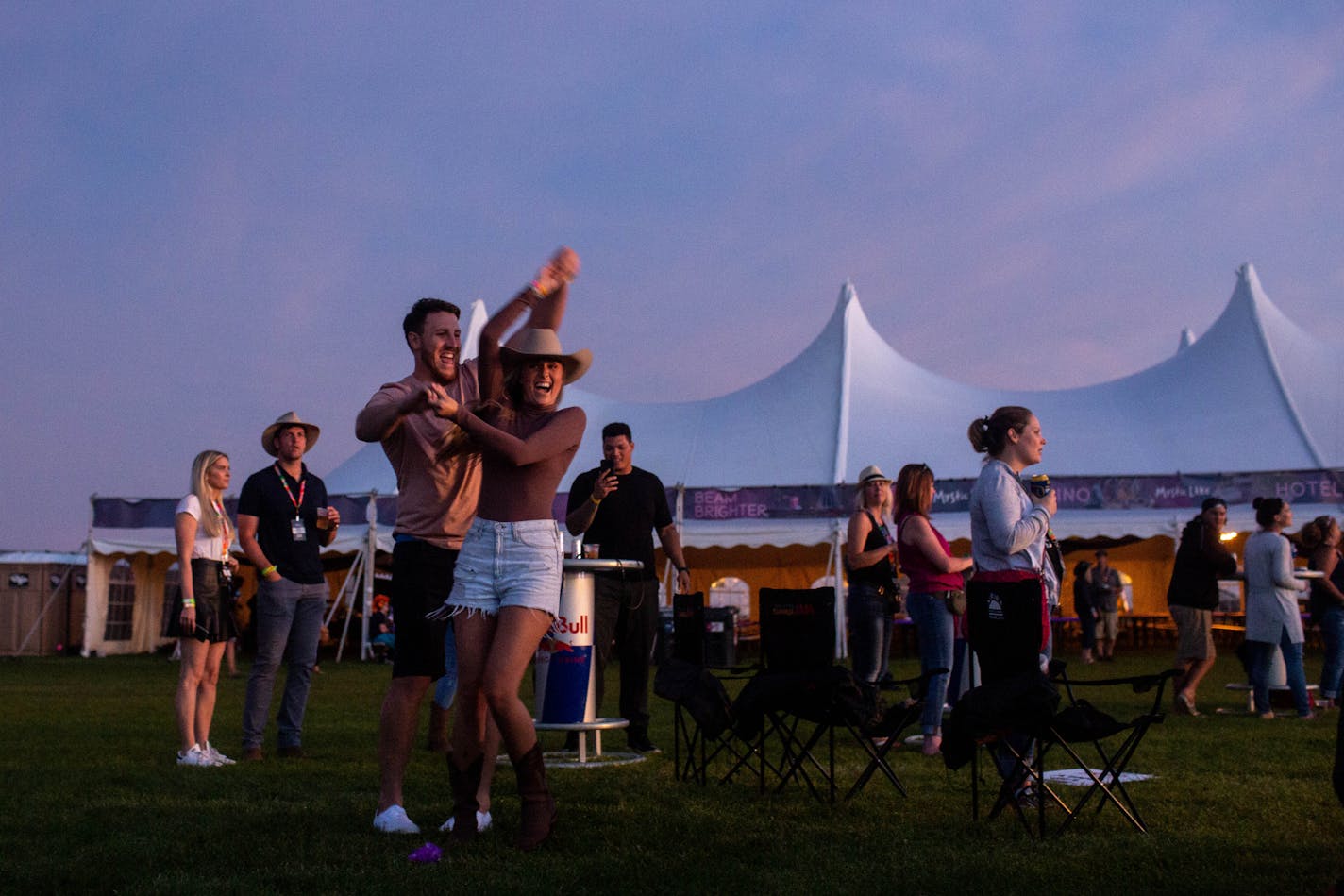 A couple dances to Tim McGraw.