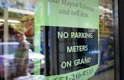 A customer walked into Frattelone Ace Hardware passed a sign that asked for support of no parking meters along Grand Avenue in St. Paul.