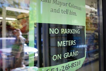 A customer walked into Frattelone Ace Hardware passed a sign that asked for support of no parking meters along Grand Avenue in St. Paul.