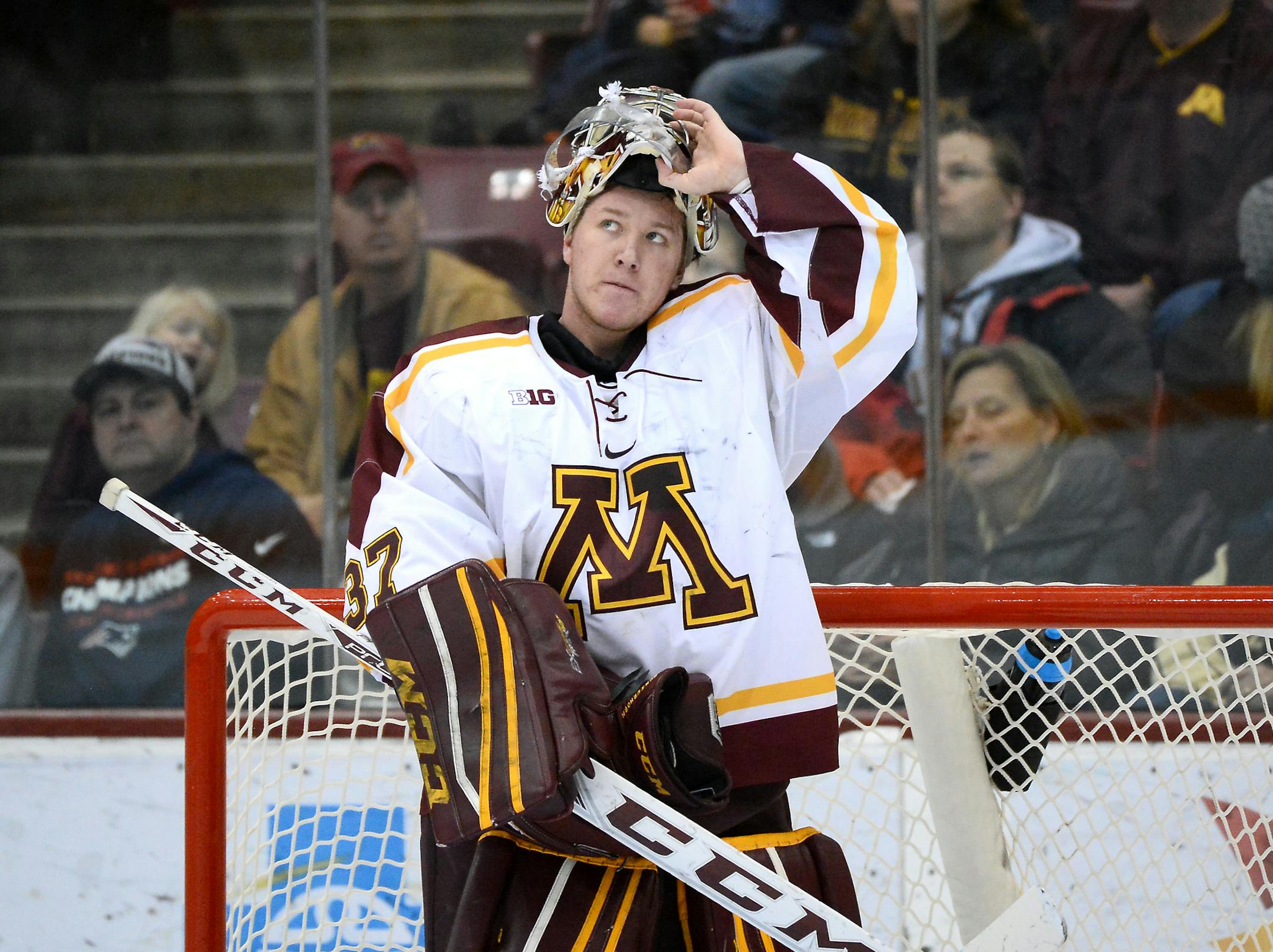 Minnesota Golden Gophers goalie Eric Schierhorn (37) looked up in frustration at the replay board after allowing a tying goal in the second period against the Connecticut Huskies. ] (AARON LAVINSKY/STAR TRIBUNE) aaron.lavinsky@startribune.com The University of Minnesota Golden Gophers men's hockey team played the Connecticut Huskies on Friday, Jan. 1, 2016 at Mariucci Arena in Minneapolis, Minn. ORG XMIT: MIN1601012207193646 ORG XMIT: MIN1603101749210704