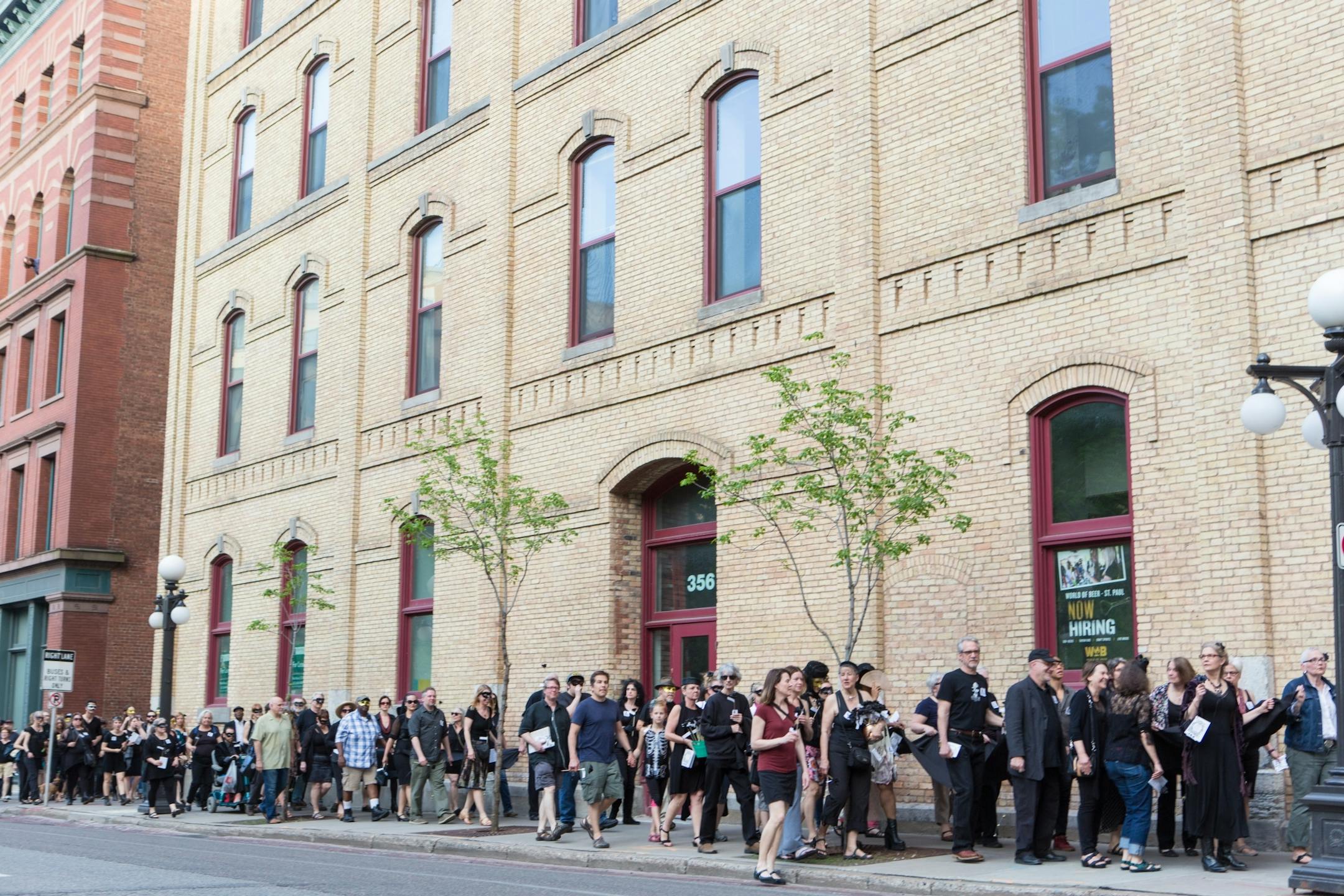 Former Jax building tenants and lower town arts supporters hold a wake to honor their longtime artistic quarters. Funeral began at Union Depot and then proceeded to the Jax building