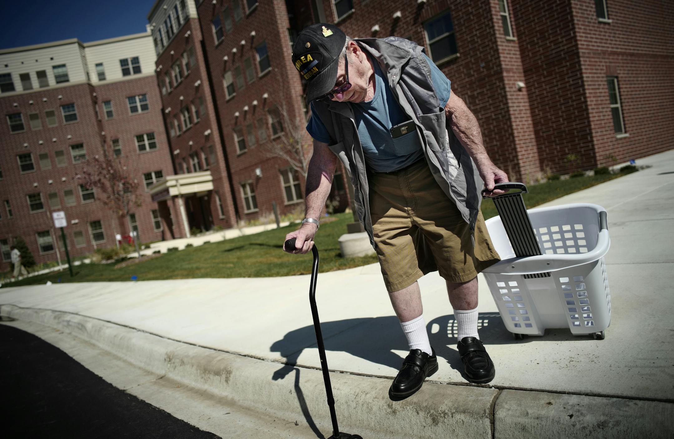 Ronald Grazzini, a Korean War Veteran was on his way to Walmart to take care of some shopping. The 100 unit Richard A. Brustad Homes opens to veterans in to help end homelessness among military Veterans in the state. ]Richard.tsong-taatarii@startribune.com