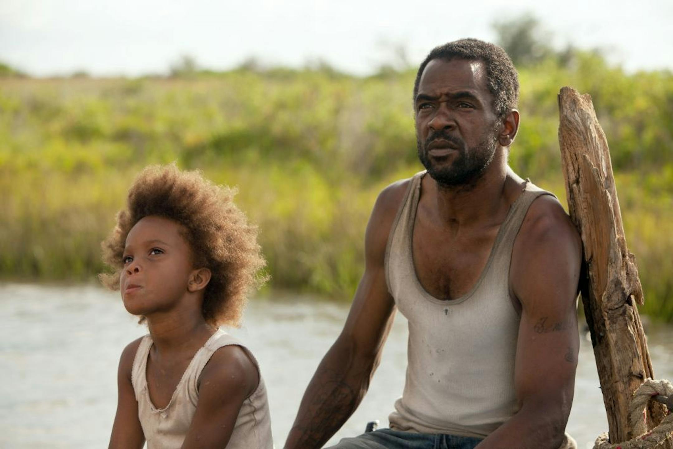 Quvenzhane Wallis portraying Hushpuppy, left, and Dwight Henry as Wink in a scene from, "Beasts of the Southern Wild."