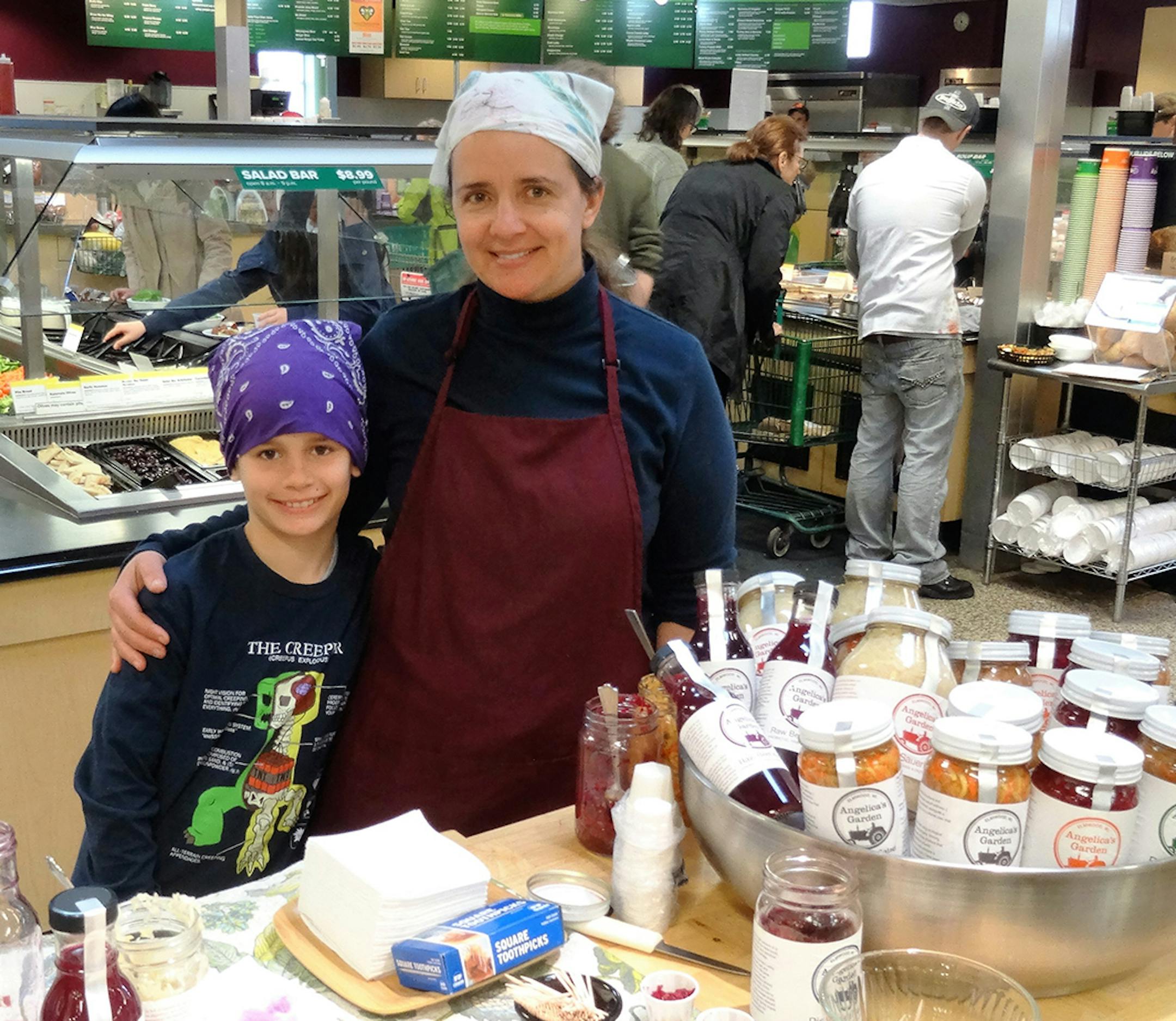 Provided photo Angelica Hollstadt of Angelica's Gardens and her son, Walter, were providing product samples at Seward Co-op.