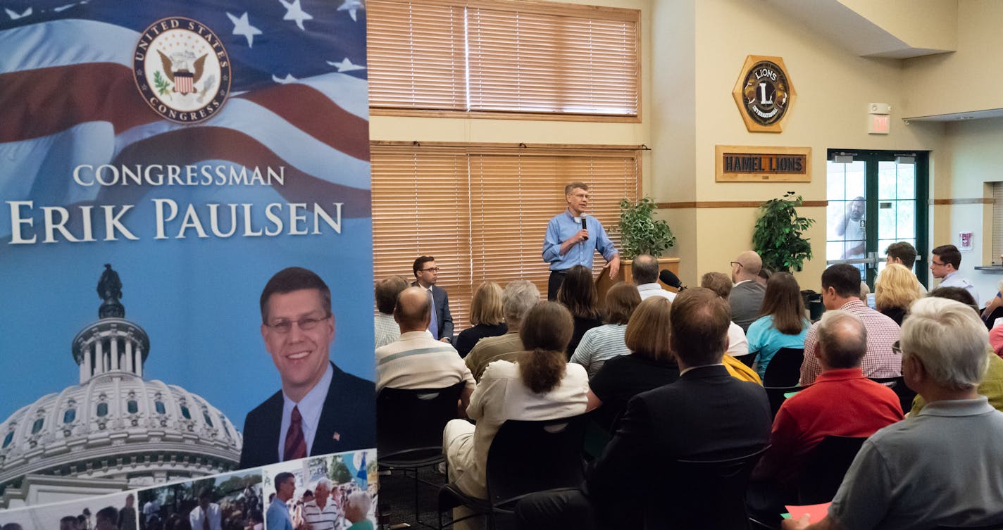 U.S. Rep. Erik Paulsen answered questions at a town hall meeting in Hamel, MN. ] GLEN STUBBE * gstubbe@startribune.com Wednesday, May 30, 2018 -- With U.S. Rep. Erik Paulsen is holding three town halls, which his opponents in his district say he has been avoiding for years. Paulsen faces a tough re-election but is coming off a major policy victory having crafted the Tax Cut and Jobs Act last year. What's Happening at this time: Rep. Erik Paulsen town hall. Big, potentially raucous crowd expected