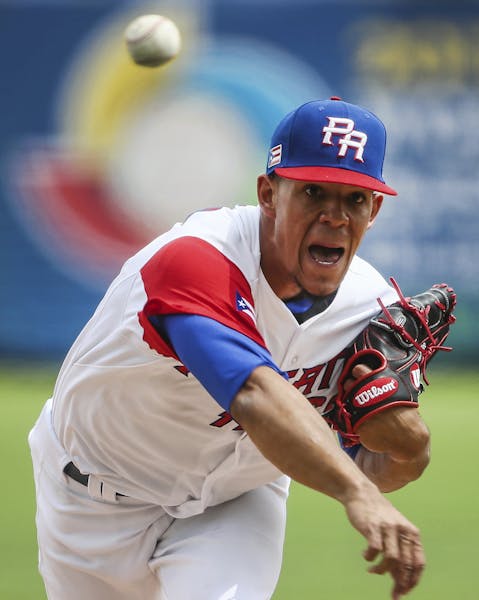 Puerto Rico's starting pitcher Jose Berrios delivers during the first inning of a game against Italy at the World Baseball Classic in Guadalajara, Mex