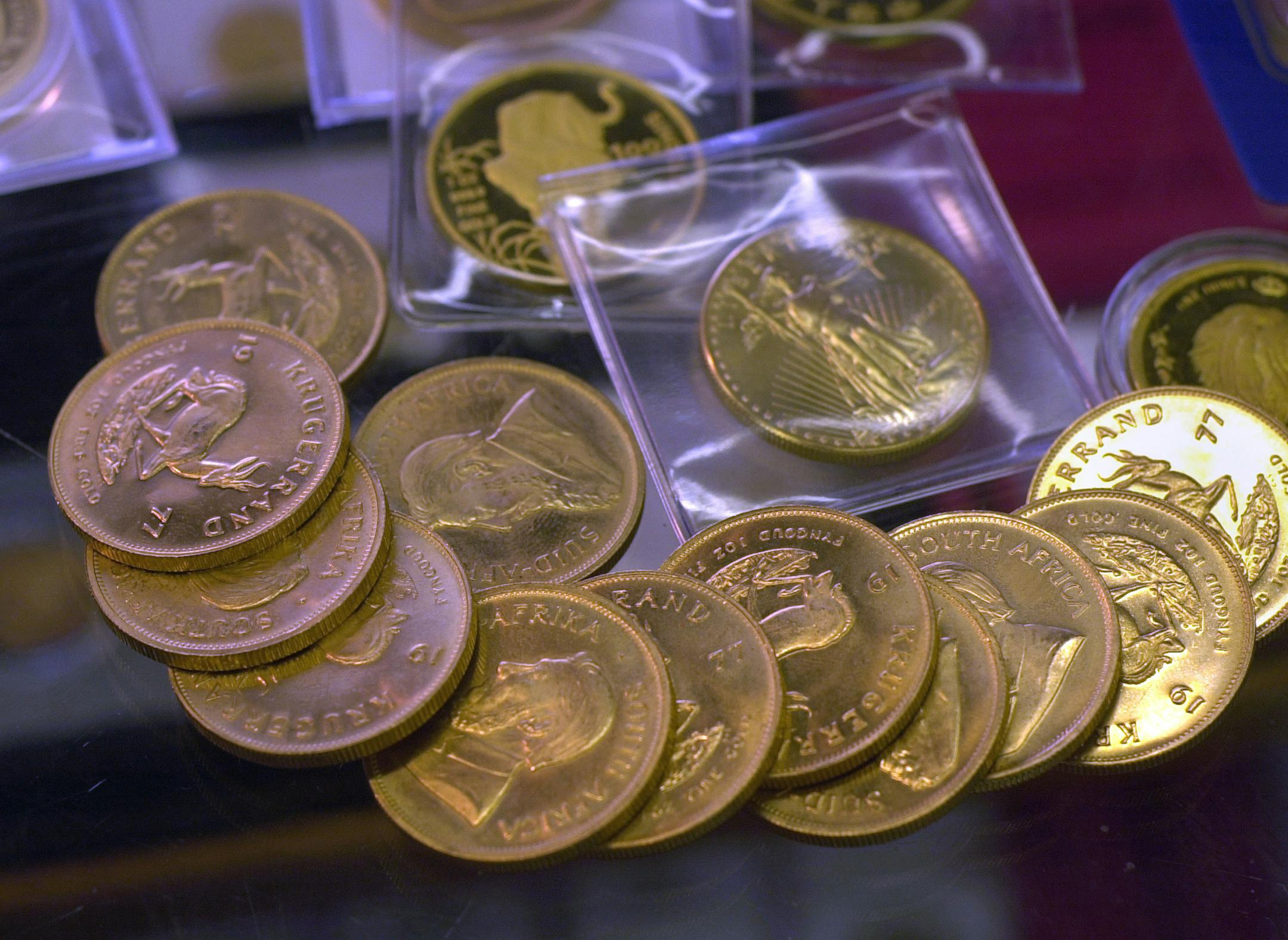 GENERAL INFORMATION: Minneapolis,Mn. Friday 5/31/2002 Gold rose to its highest level in 31 months as rising tensions in the Middle East, falling U.S. stocks and a weakening dollar spurred investors to seek a haven. The metal has its biggest monthly gain since September 1999. 550. And not surprisingly, gold coin dealers in the Twin Cities are reporting a huge surge in the number of customers who are buying. IN THIS PHOTO: Krugerand's and a Golden Eagle on the counter top of Premium Quality Coin