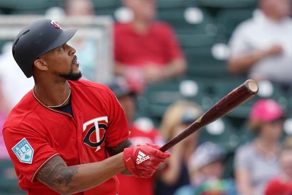 Byron Buxton watched after hitting a two-run home run during Monday's spring training game against the Baltimore Orioles.