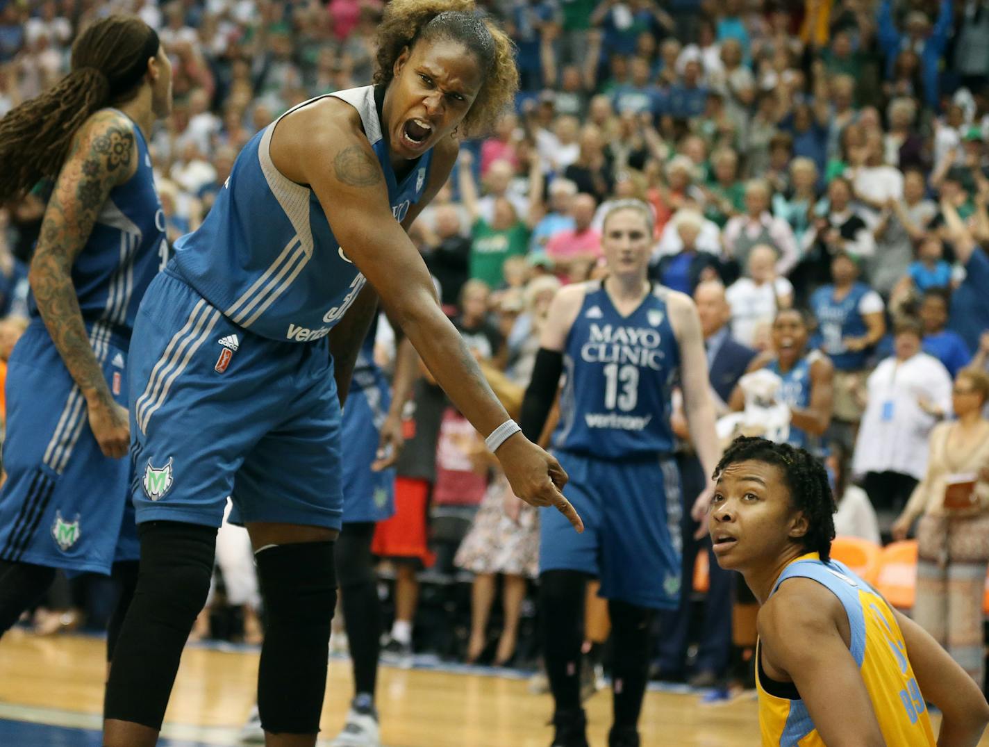 Minnesota Lynx forward Rebekkah Brunson (32) pointed to the floor let letting the referee know that Chicago Sky center Imani Boyette (34) was out of bounds to end the game at Target Center Tuesday July 5, 2016 in Minneapolis , MN.] Minnesota Lynx beat the Chicago Sky 87-82 Tuesday night at Target Center. Jerry Holt /Jerry.Holt@Startribune.com