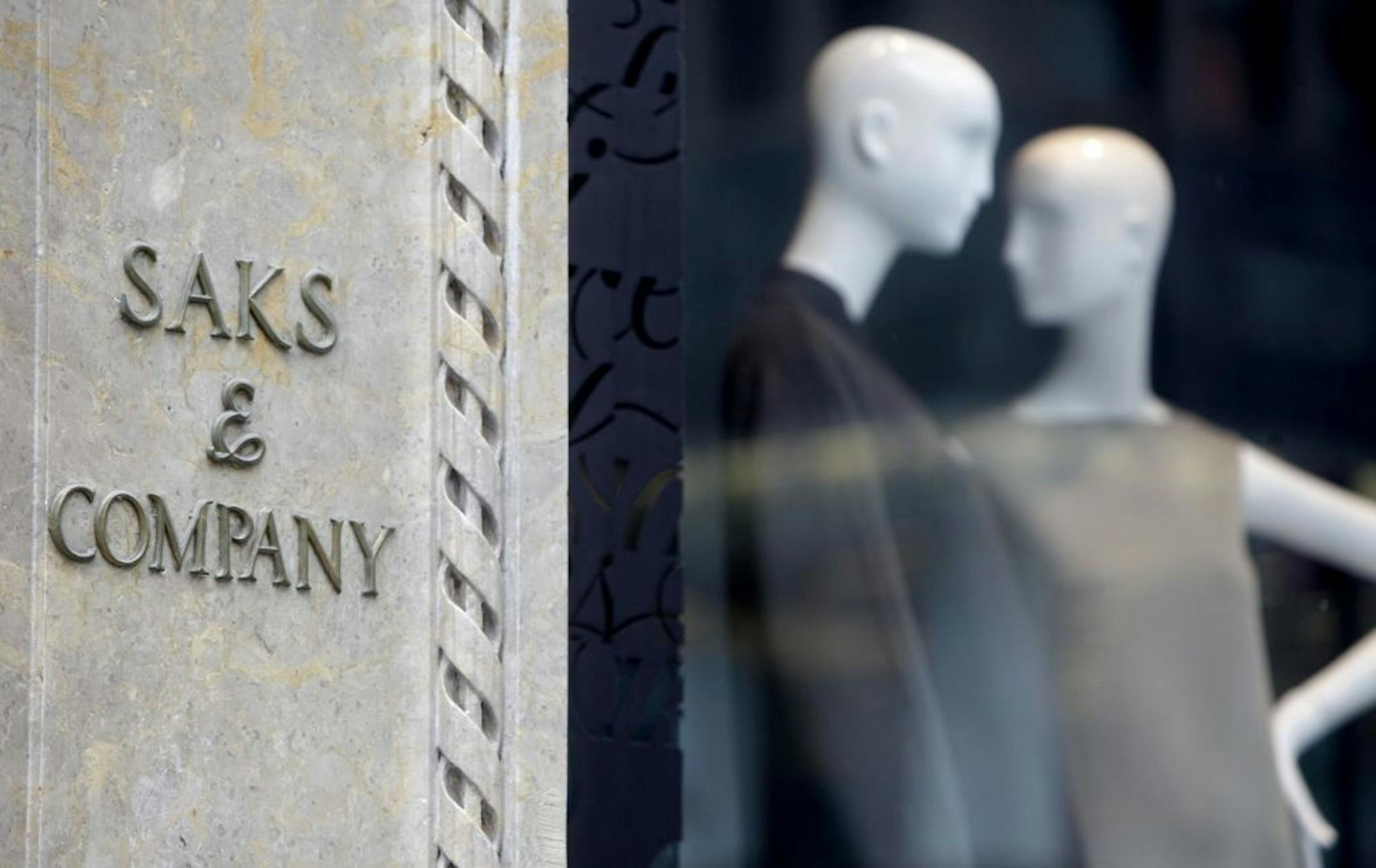FILE - This Aug. 15, 2011, file photo shows Saks & Company in New York. Hudson's Bay, the parent of Lord & Taylor, is purchasing Saks for approximately $2.4 billion. Hudson's Bay will pay $16 per share for Saks, a 5 percent premium over the company's Friday, July 26, 2013 closing price of $15.31.