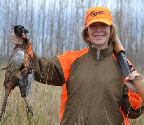 Lt. Gov. Tina Smith with a rooster bagged near Montevideo Saturday morning, opening day of the ringneck season.
