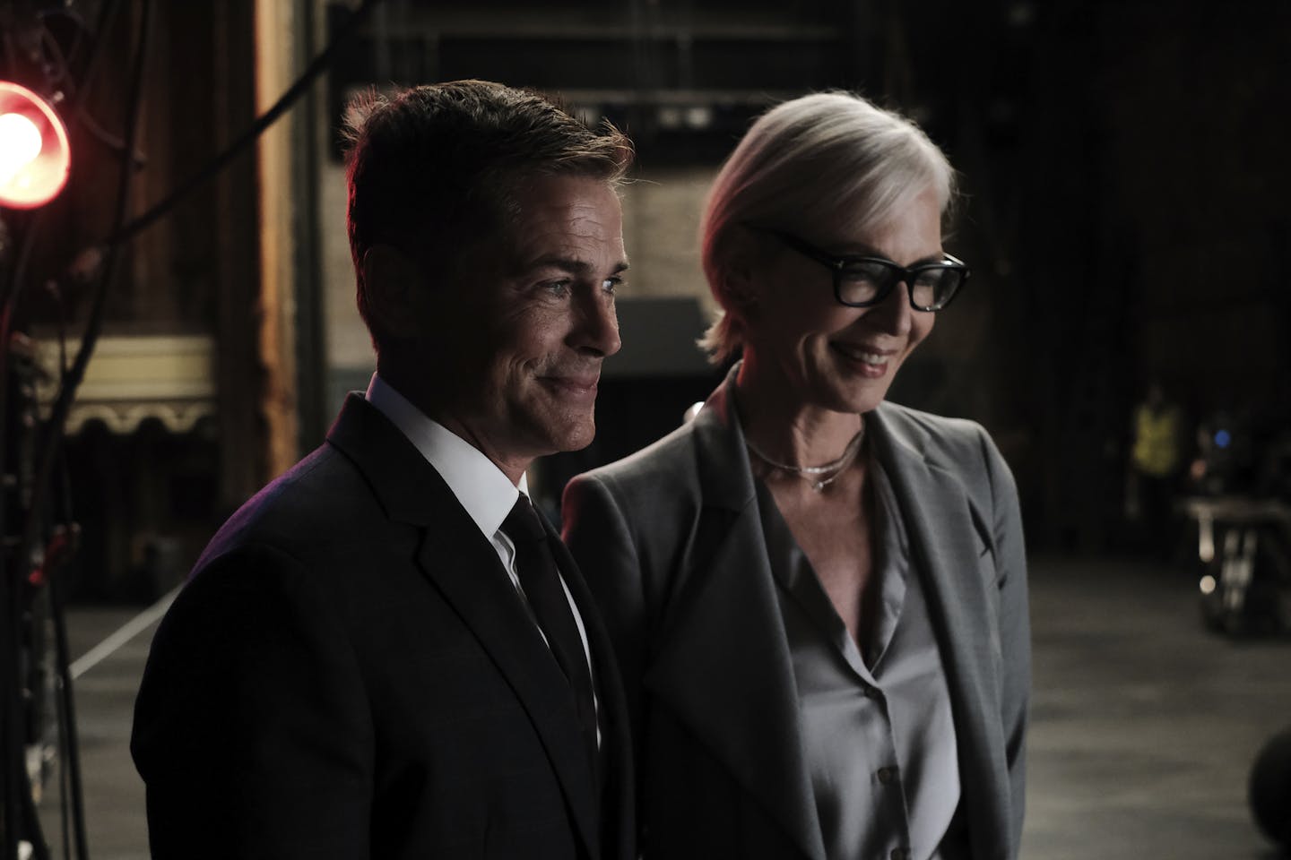 This image released by HBO Max shows Rob Lowe, left, and Allison Janney during "A West Wing Special to Benefit When We All Vote," a stage presentation of the "Hartsfield's Landing" episode from the third season of "The West Wing" TV series, debuting Thursday on HBO Max. (Eddy Chen/HBO Max via AP)