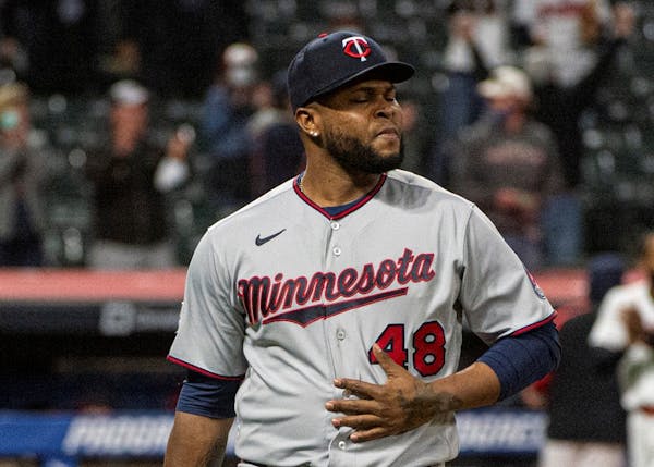 Minnesota Twins relief pitcher Alex Colome walks to the dugout after Monday's loss.