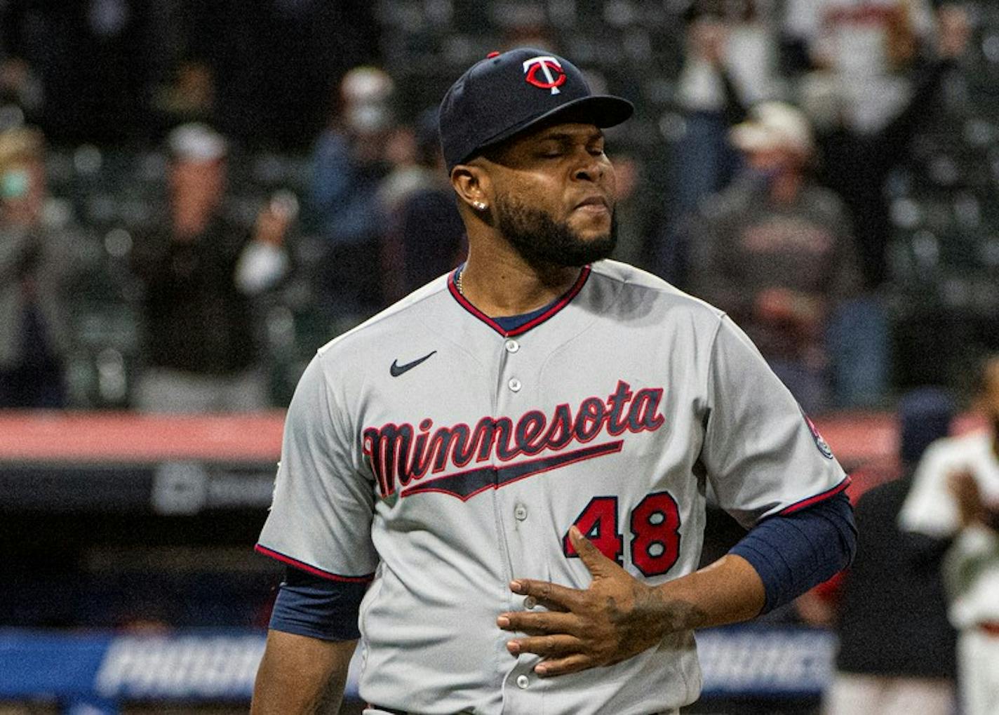 Minnesota Twins relief pitcher Alex Colome walks to the dugout after Monday's loss.